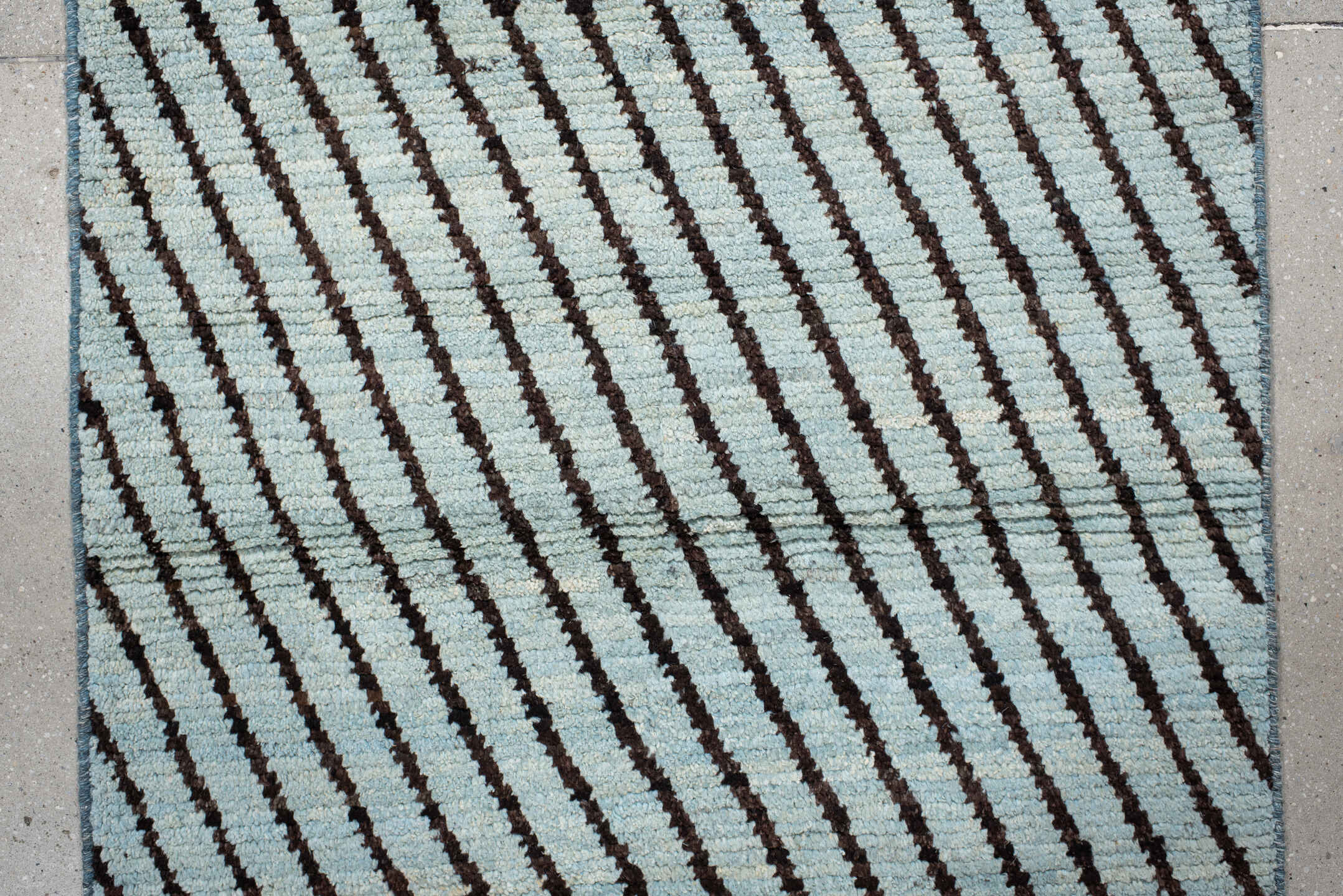 3' x 9' one-of-a-kind handmade vintage Tulu runner rug. Color palette: ivory, charcoal, slate, gray, black