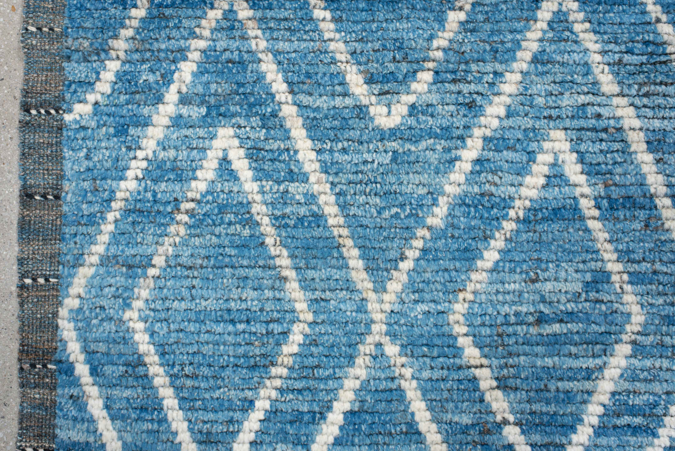5' x 6' one-of-a-kind handmade vintage Tulu rug. Color palette: blue, ivory, slate, charcoal, gray, black