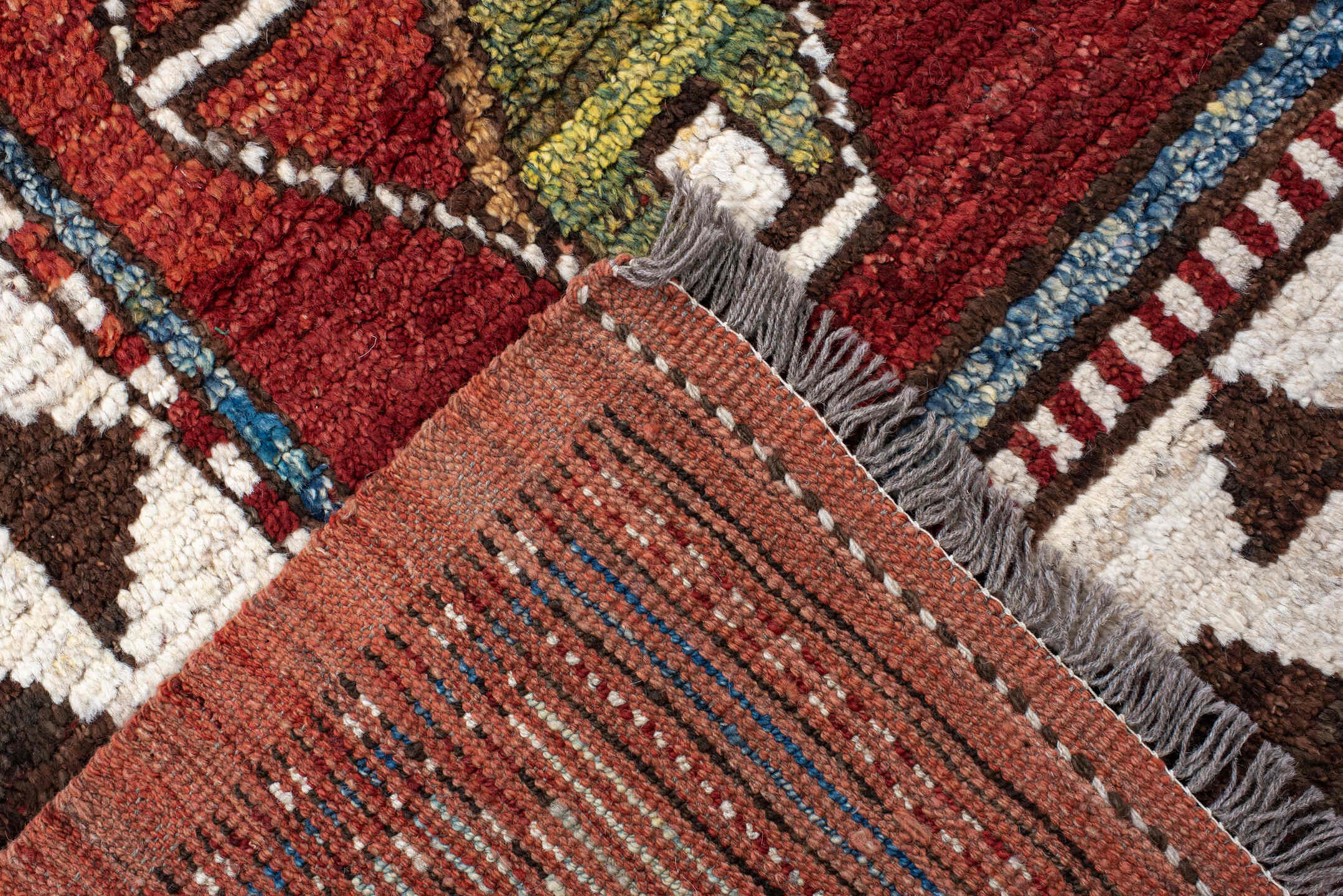 6' x 10' one-of-a-kind handmade vintage Tulu large size rug. Color palette: rust, ivory, brown, brick, blue, olive, charcoal