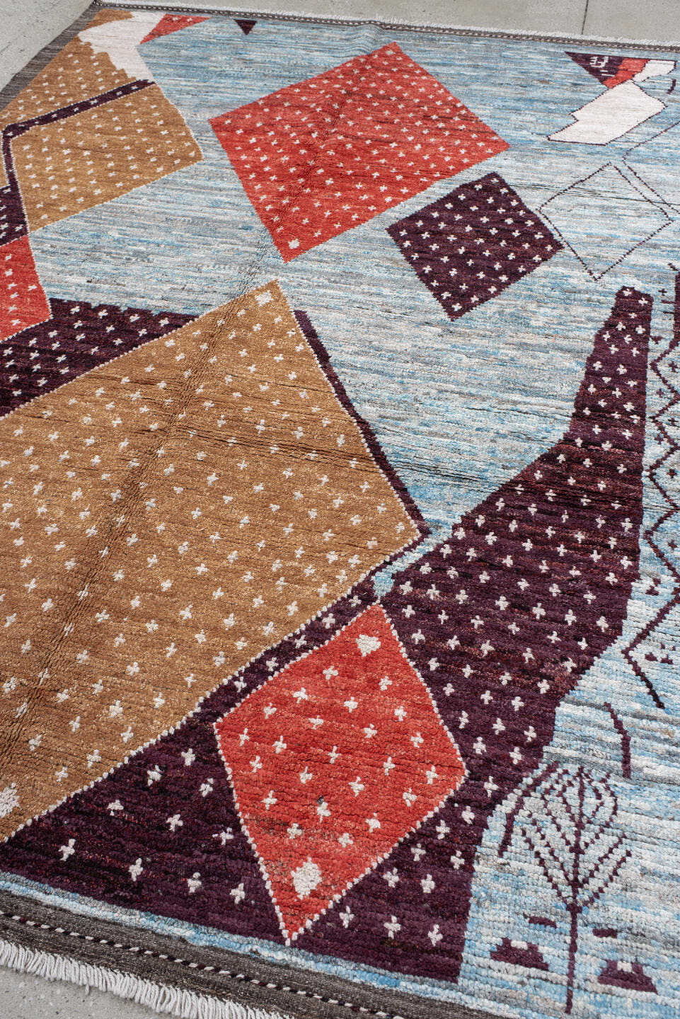 6' x 9' one-of-a-kind handmade vintage Tulu large size rug. Color palette: light blue, camel, plum, rust, ivory, charcoal