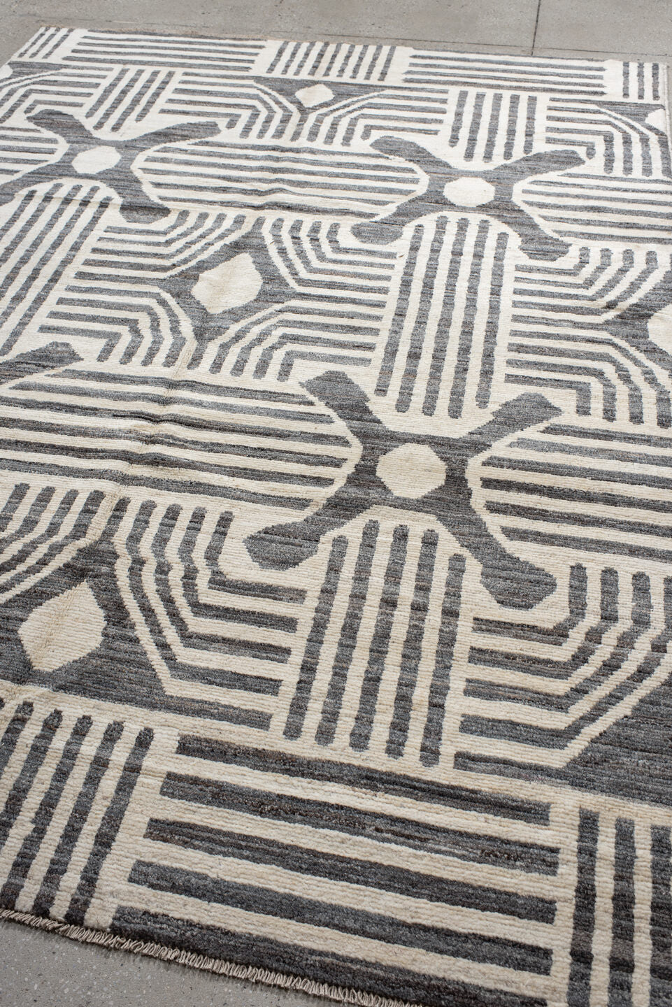 6' x 9' one-of-a-kind handmade vintage Tulu large size rug. Color palette: ivory, charcoal, cream, gray, black