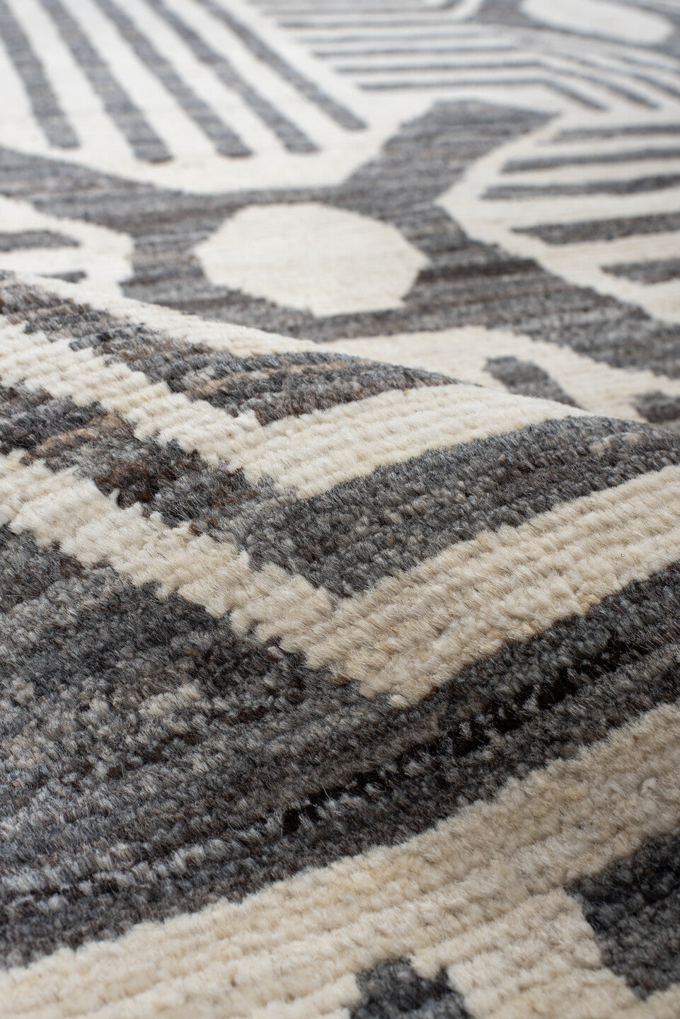 6' x 9' one-of-a-kind handmade vintage Tulu large size rug. Color palette: ivory, charcoal, cream, gray, black