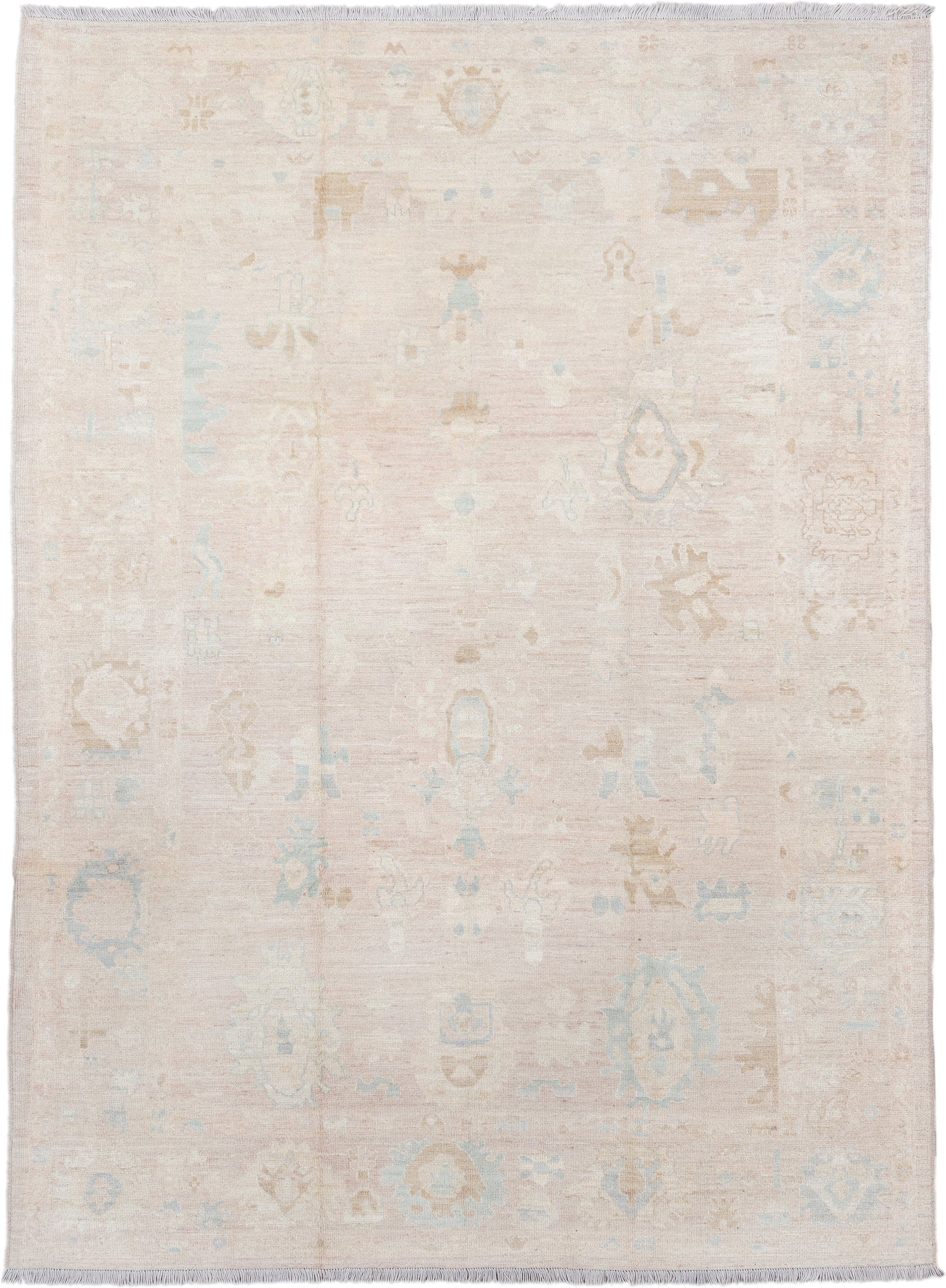 8' x 12' one-of-a-kind handmade vintage Oushak large size rug. Color palette: ivory, cream, blush, pale blue, beige, sand