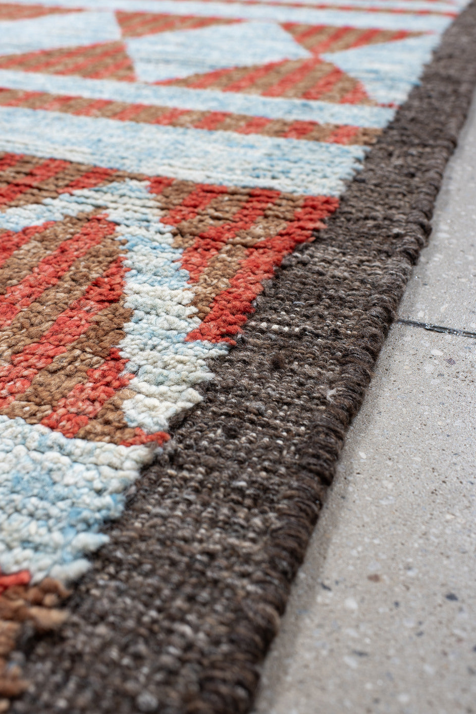 3' x 16' one-of-a-kind handmade vintage Tulu runner rug. Color palette: rust, ivory, sky blue, charcoal, terracotta, brown