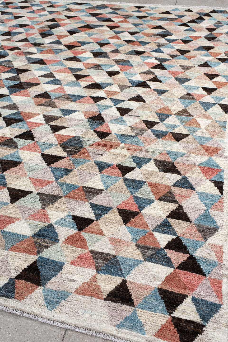 8' x 10' one-of-a-kind handmade vintage Tulu large size rug. Color palette: ivory, sky_blue, charcoal, coral, taupe, slate
