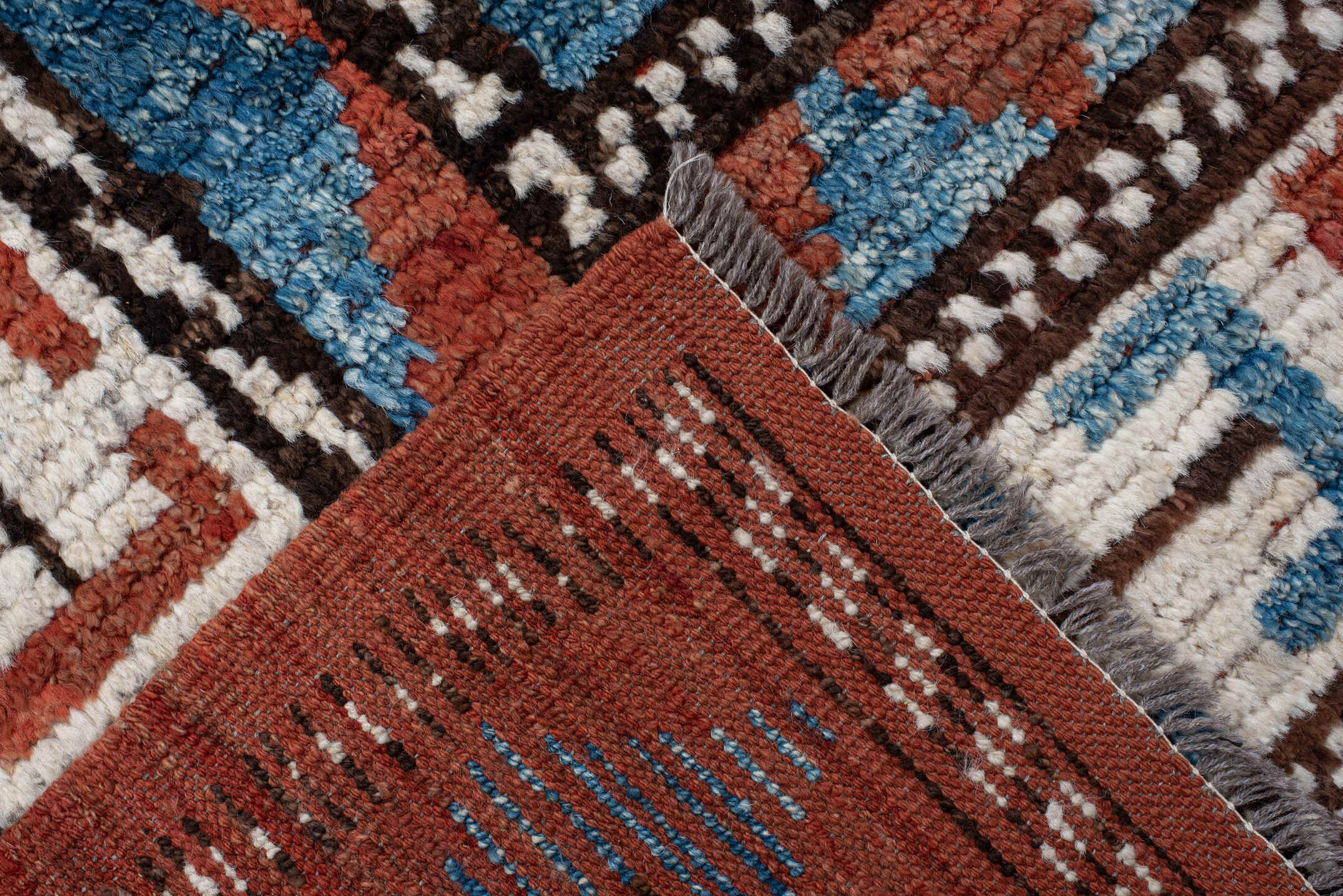 7' x 9' one-of-a-kind handmade vintage Tulu large size rug. Color palette: sky blue, rust, ivory, dark brown, brick, black