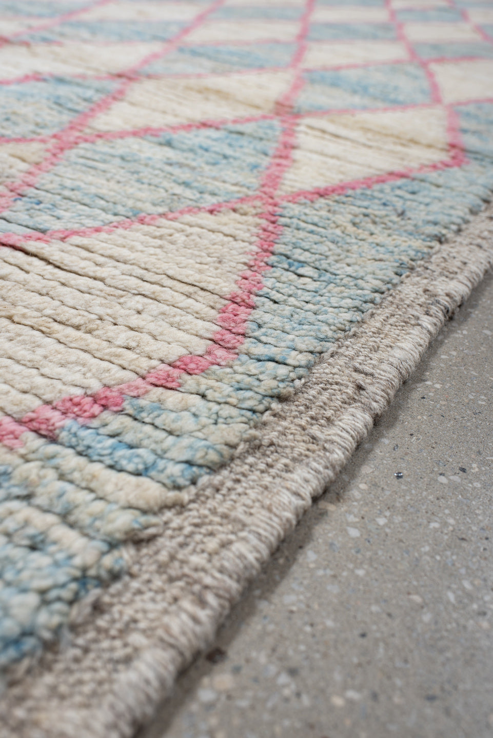 3' x 9' one-of-a-kind handmade vintage Tulu runner rug. Color palette: ivory, sky blue, pink, taupe, light blue, beige, gray