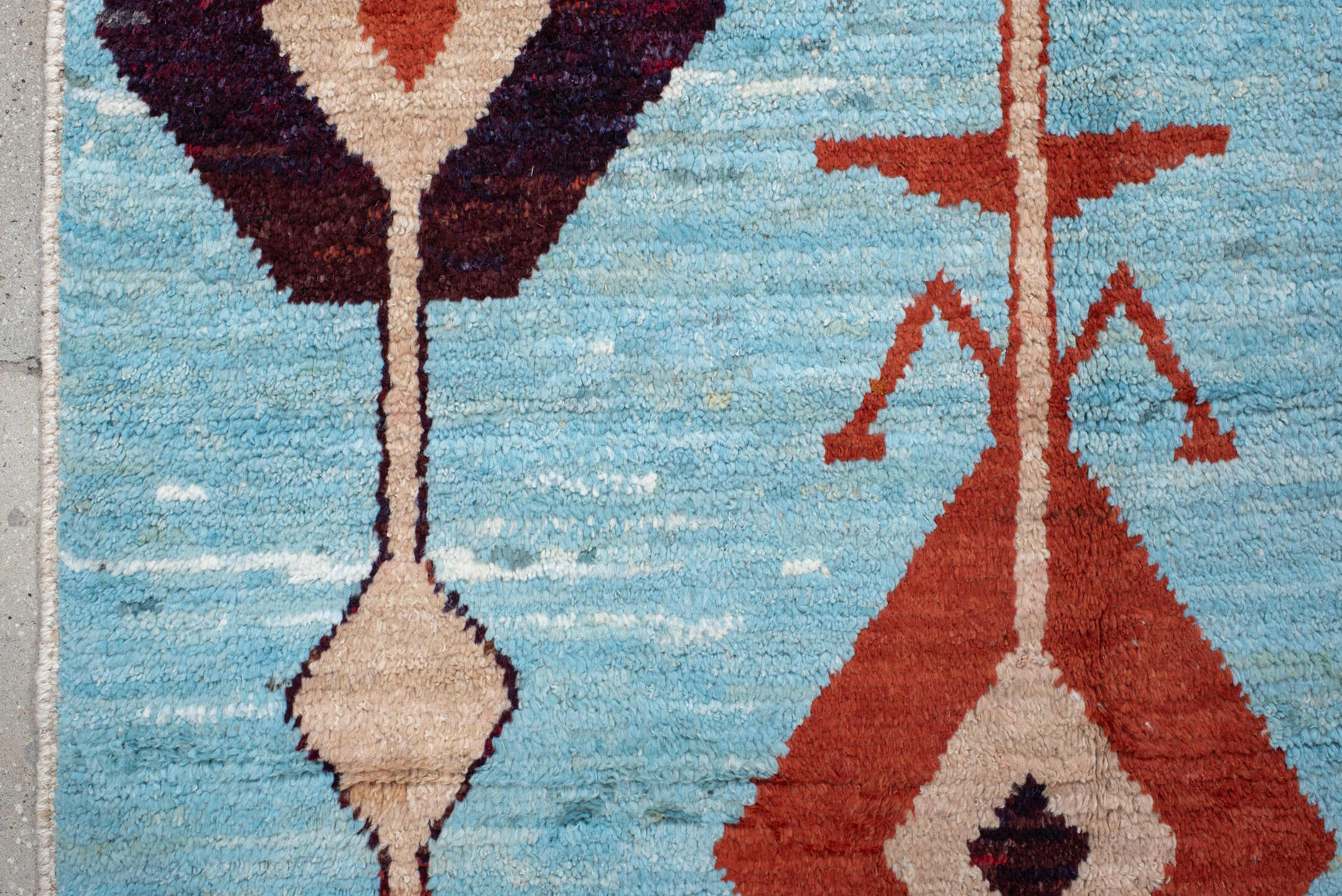6' x 9' one-of-a-kind handmade vintage Tulu medium size rug. Color palette: sky blue, rust, ivory, plum, cream, terra cotta