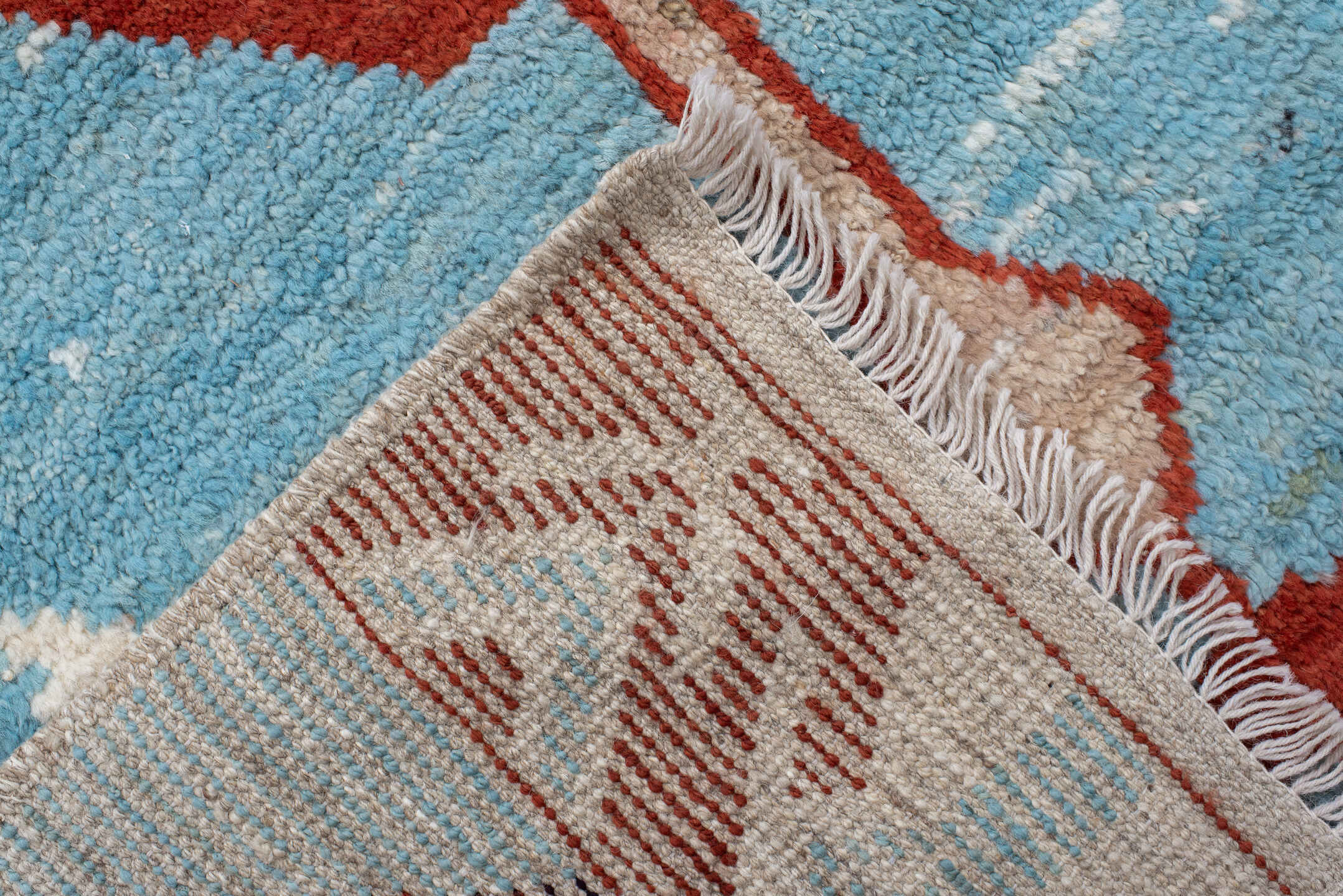 6' x 9' one-of-a-kind handmade vintage Tulu medium size rug. Color palette: sky blue, rust, ivory, plum, cream, terra cotta
