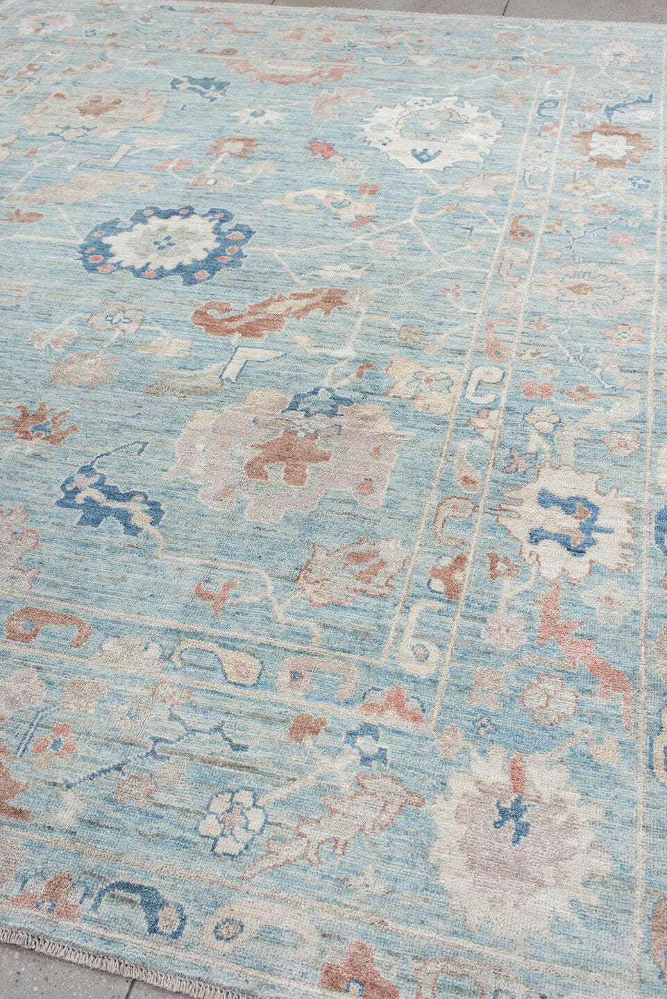 9' x 11' one-of-a-kind handmade vintage Oushak large size rug. Color palette: sky blue, ivory, blush, navy, rust, taupe
