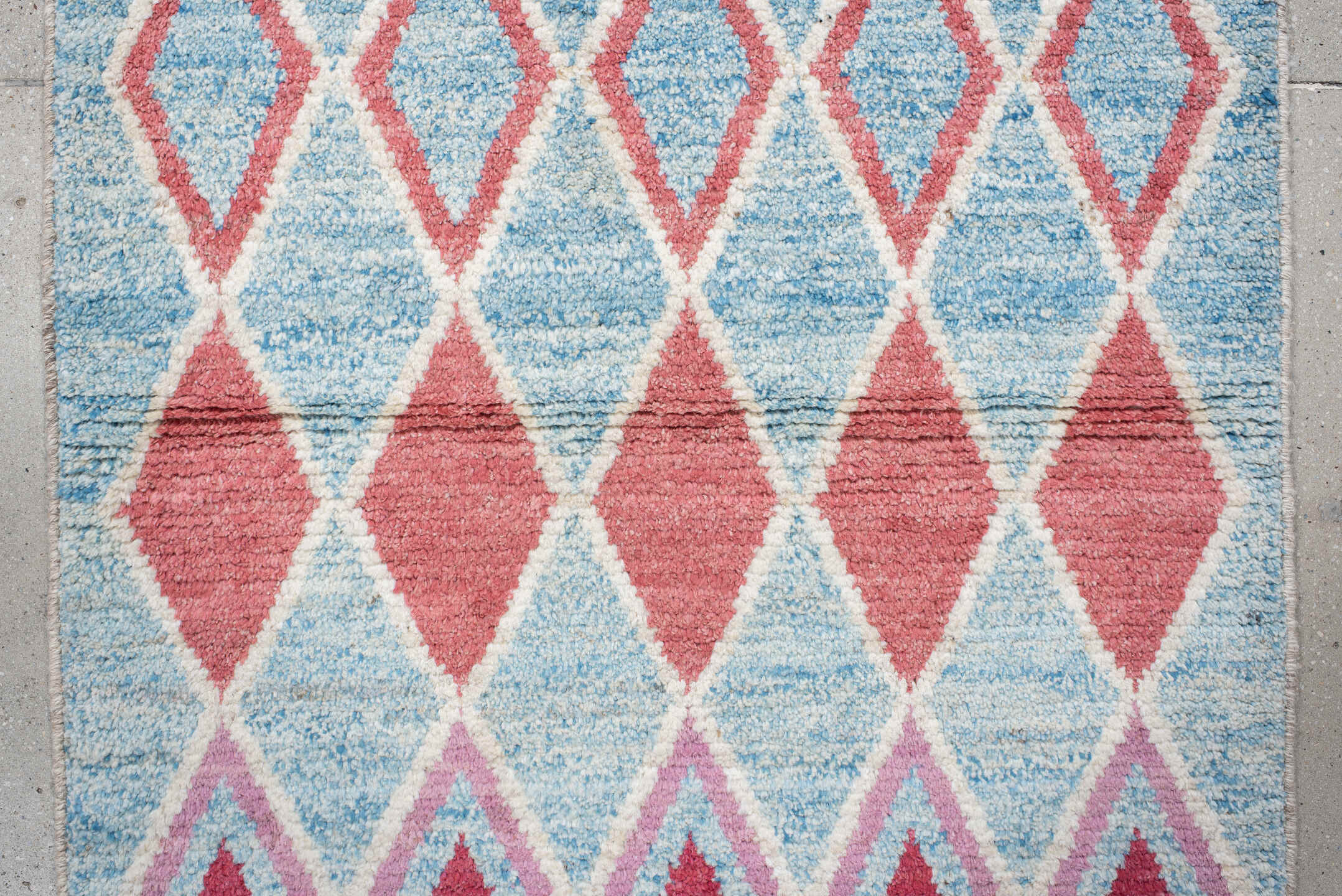 3' x 9' one-of-a-kind handmade vintage Tulu runner rug. Color palette: sky blue, ivory, rose, crimson, lavender, light blue