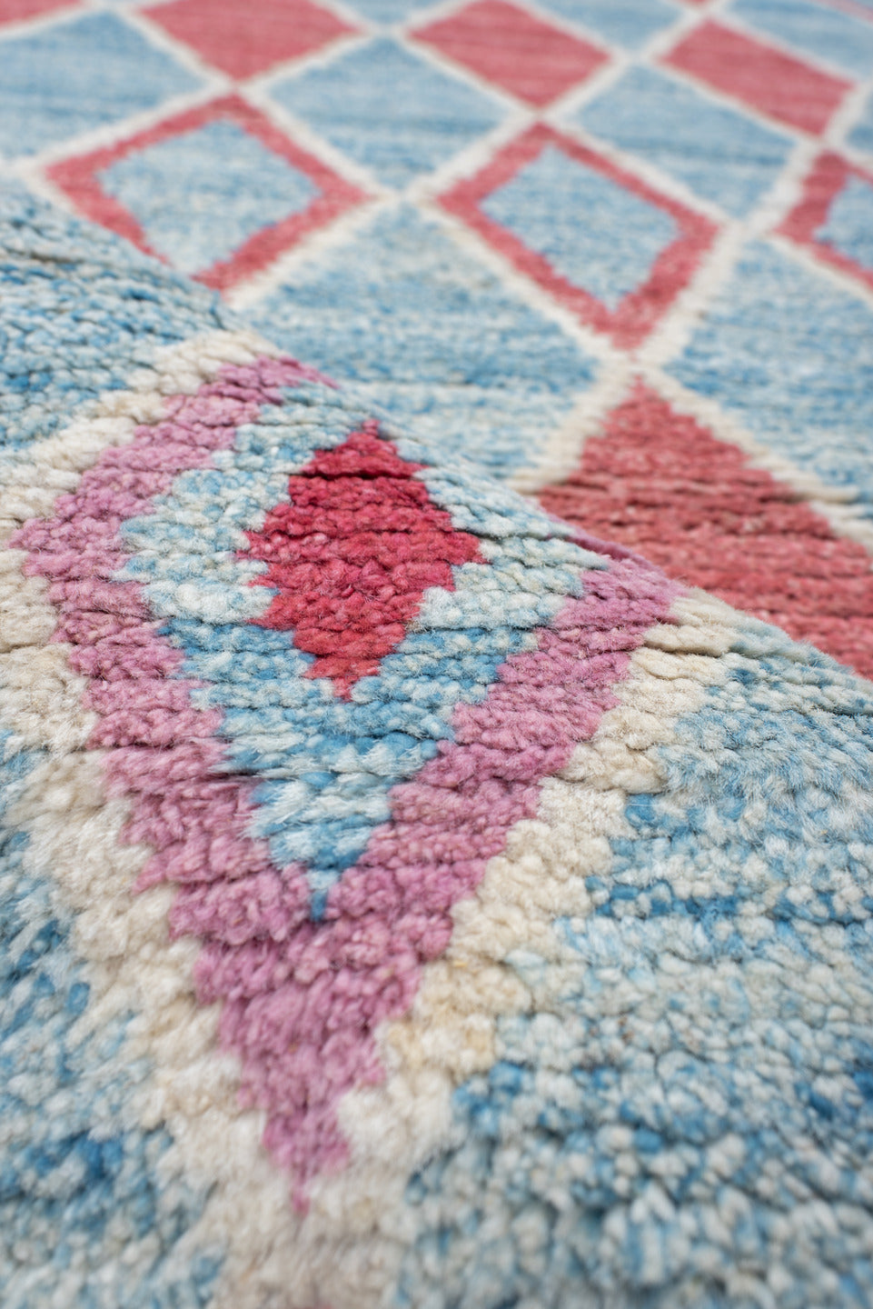 3' x 9' one-of-a-kind handmade vintage Tulu runner rug. Color palette: sky blue, ivory, rose, crimson, lavender, light blue