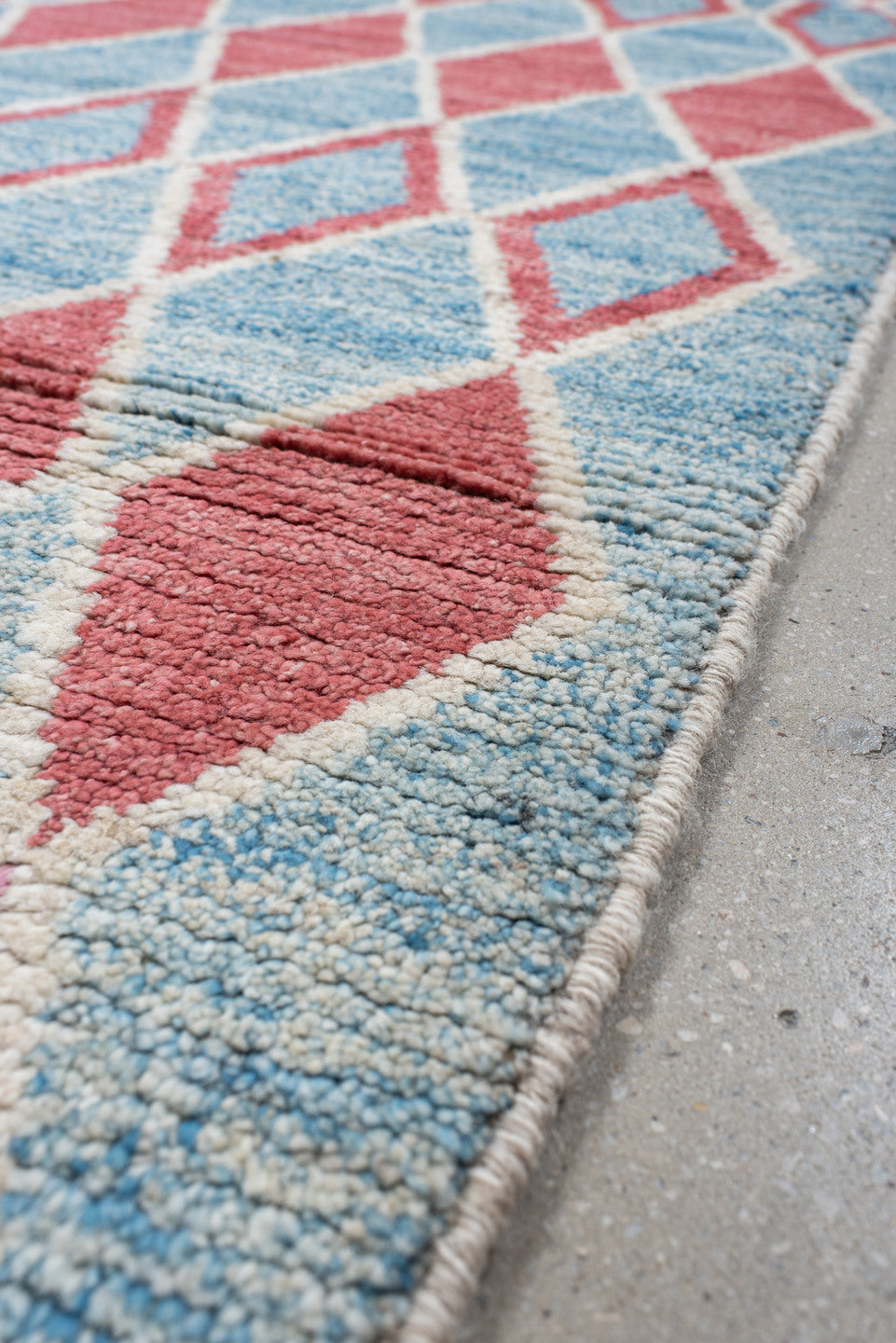 3' x 9' one-of-a-kind handmade vintage Tulu runner rug. Color palette: sky blue, ivory, rose, crimson, lavender, light blue