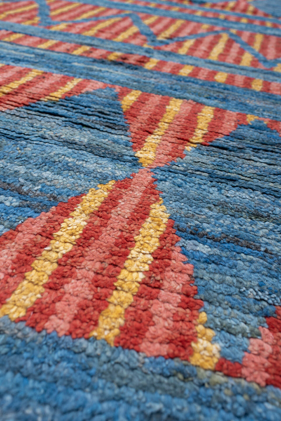 3' x 16' one-of-a-kind handmade vintage Tulu runner rug. Color palette: blue, rust, gold, ivory, orange, terracotta, brown