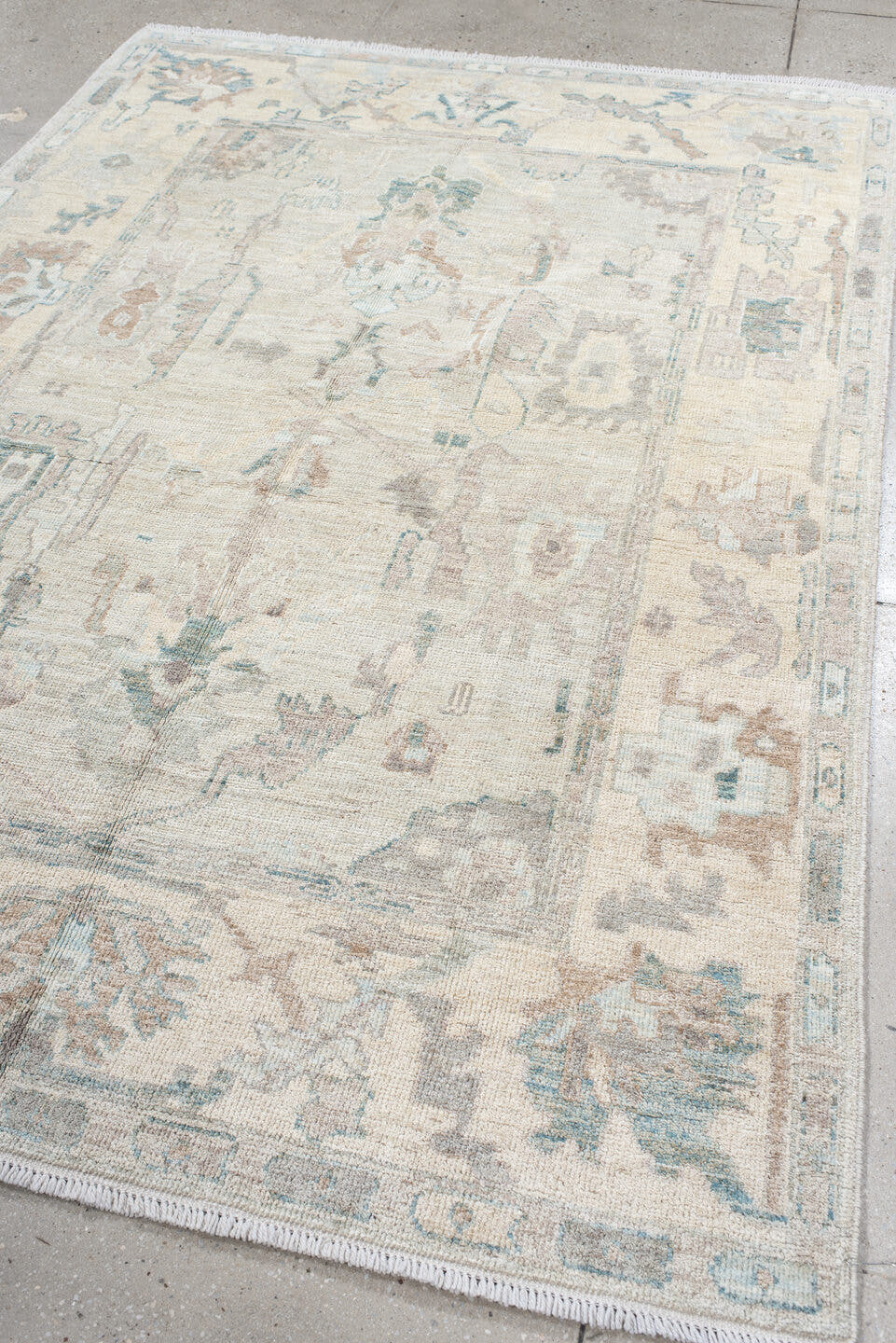 5' x 8' one-of-a-kind handmade vintage Oushak medium size rug. Color palette: ivory, pale blue, taupe, blush, light gray