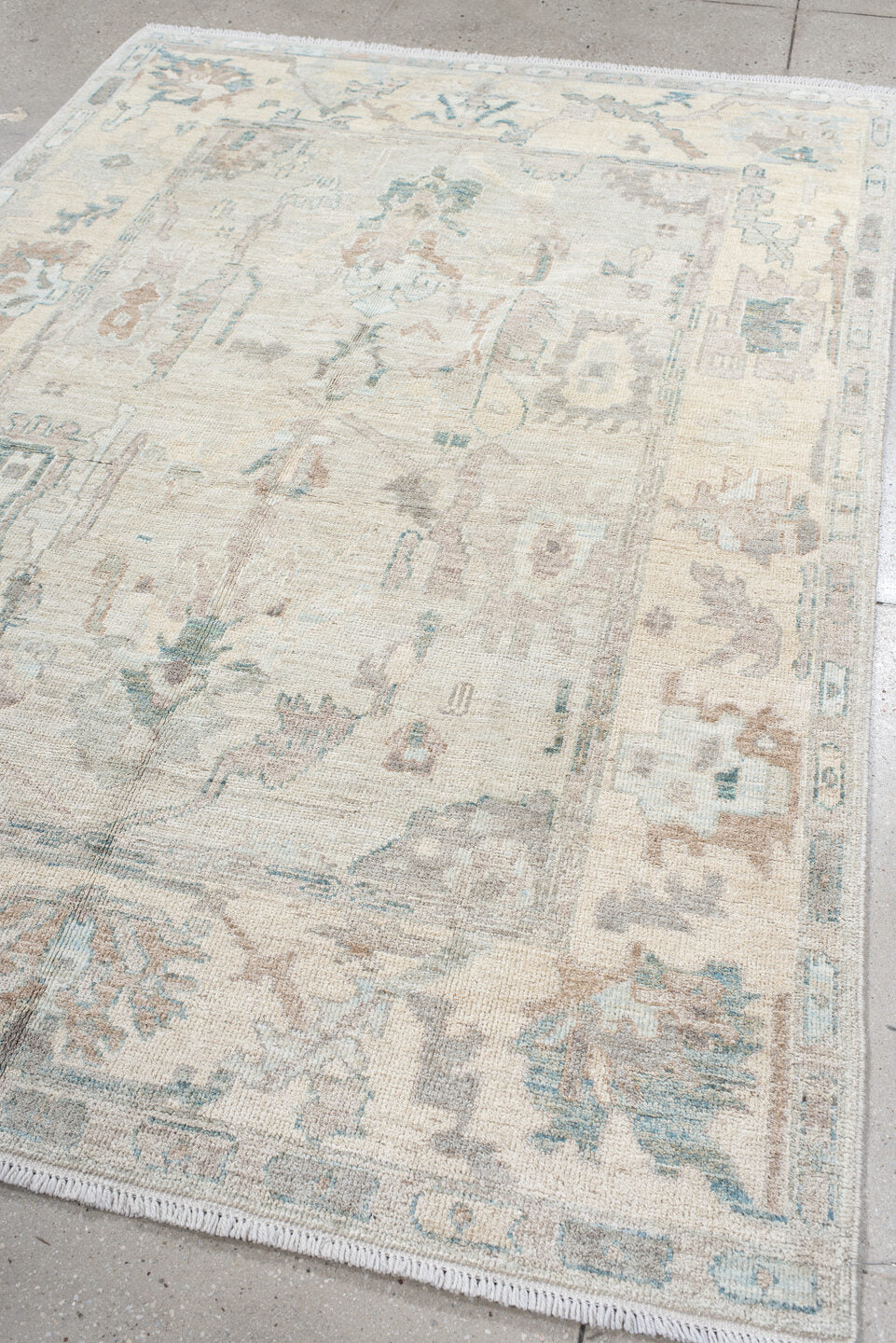 5' x 8' one-of-a-kind handmade vintage Oushak medium size rug. Color palette: ivory, pale blue, taupe, blush, light gray