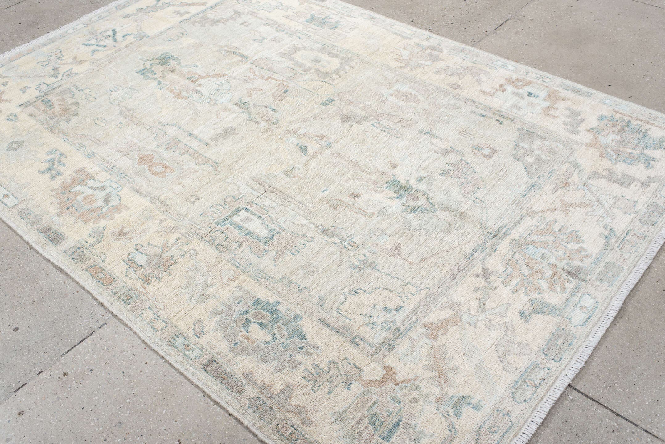 5' x 8' one-of-a-kind handmade vintage Oushak medium size rug. Color palette: ivory, pale blue, taupe, blush, light gray