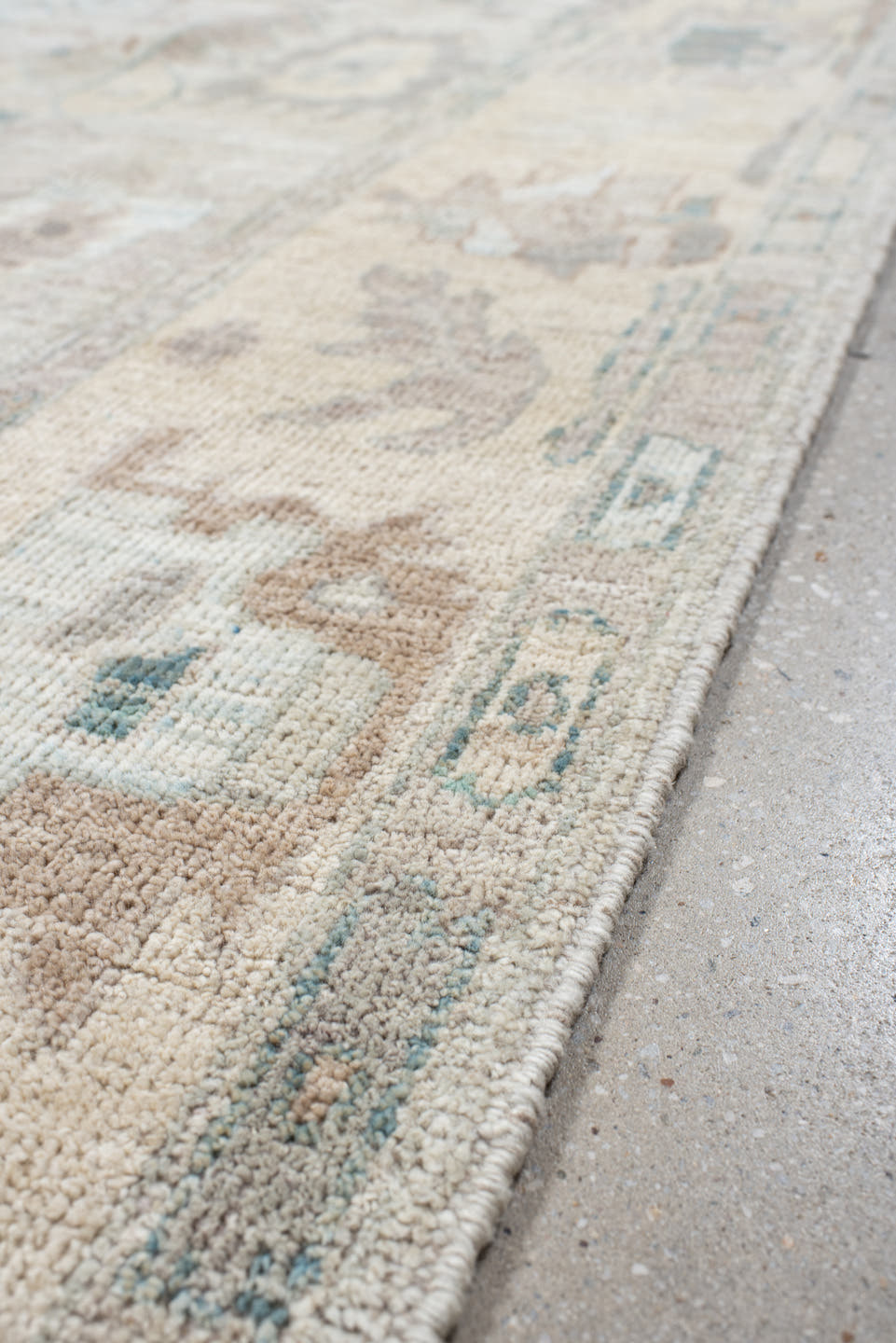 5' x 8' one-of-a-kind handmade vintage Oushak medium size rug. Color palette: ivory, pale blue, taupe, blush, light gray