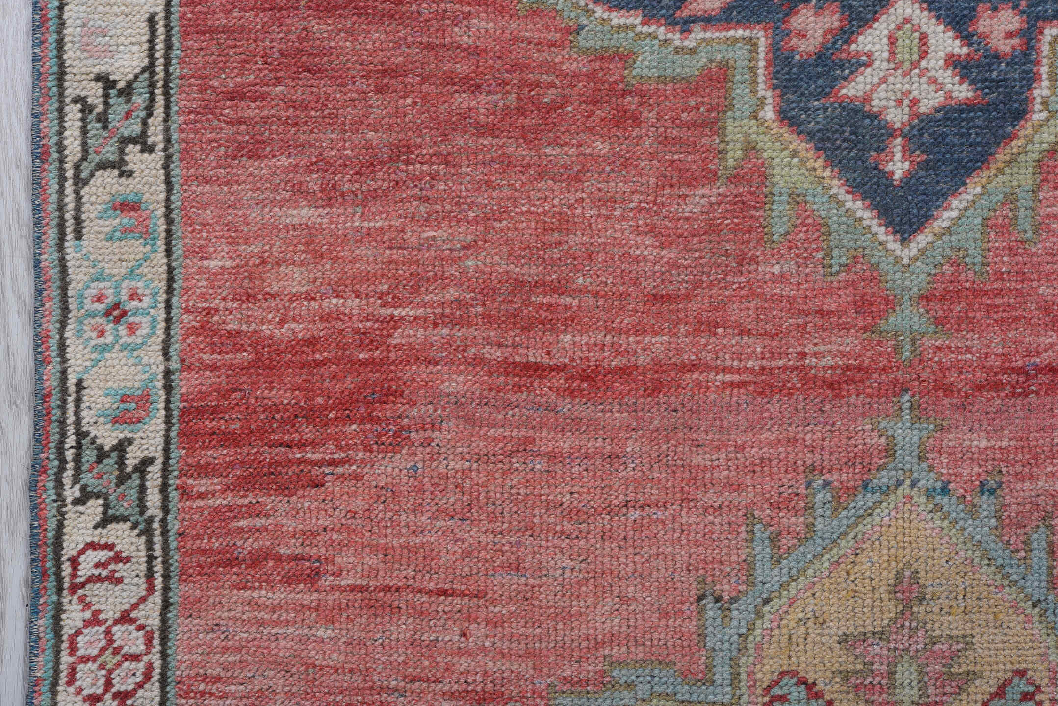 3' x 11' one-of-a-kind handmade antique Oushak runner rug. Color palette: rose, ivory, navy, turquoise, beige, coral, sage