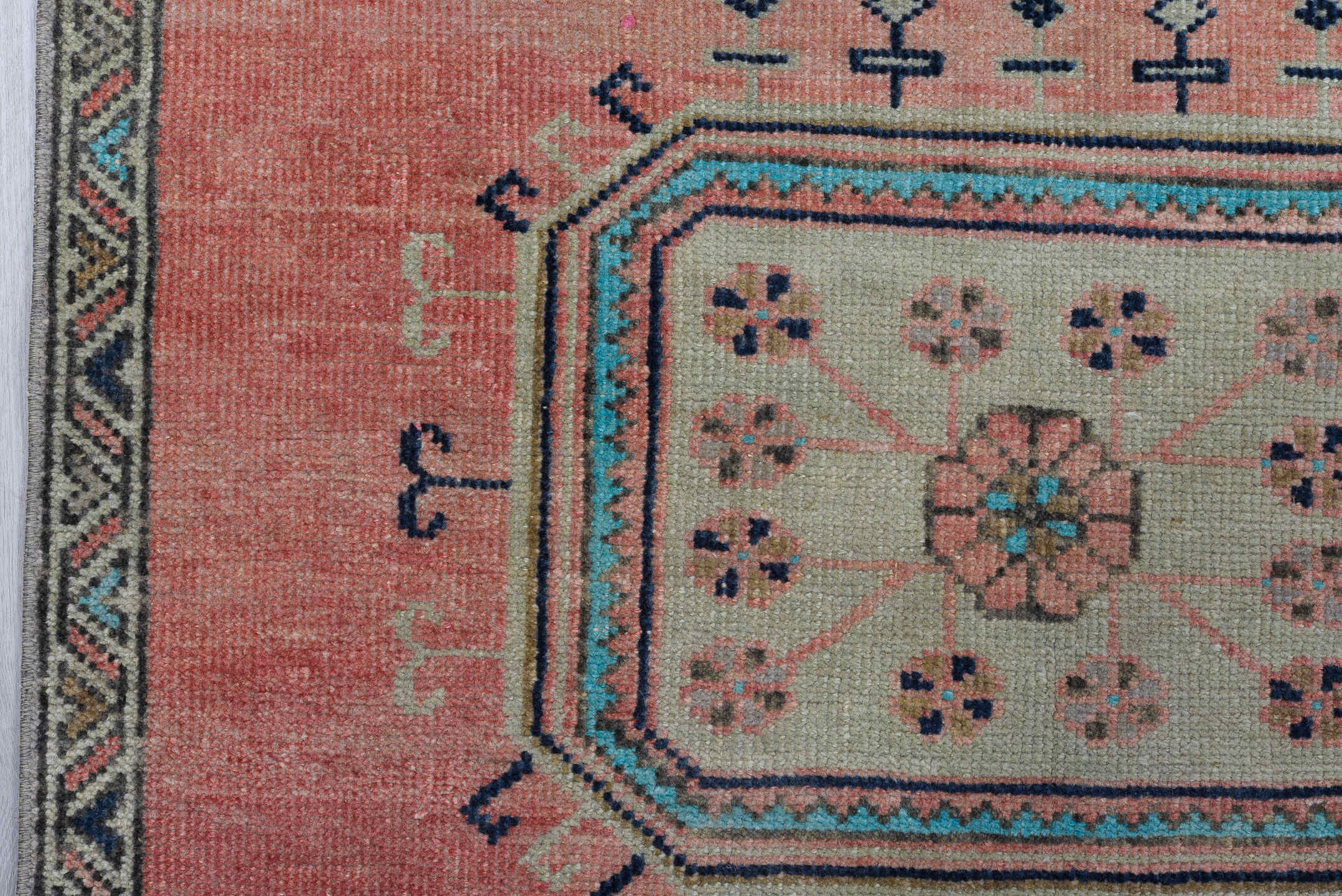 3' x 9' one-of-a-kind handmade antique Oushak runner rug. Color palette: rose, navy, ivory, aqua, taupe, charcoal, pink, red
