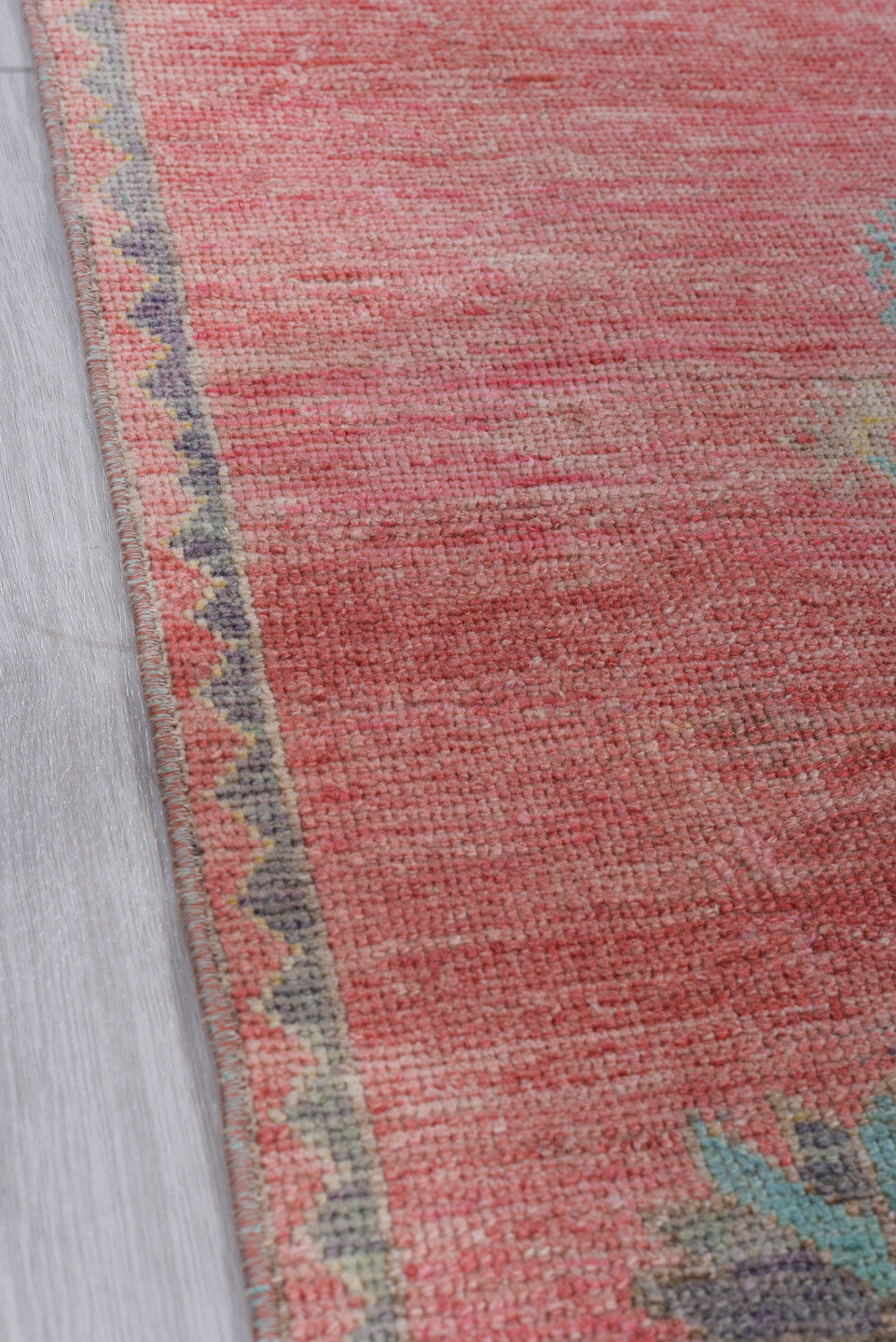 3' x 10' one-of-a-kind handmade antique Oushak runner rug. Color palette: coral, teal, slate, ivory, rose, gold, charcoal