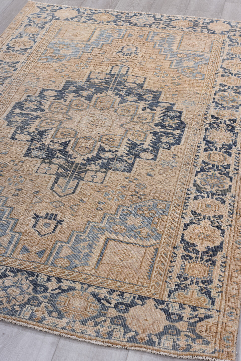 4' x 6' one-of-a-kind handmade antique Sarouk small size rug. Color palette: ivory, blue, navy, beige, camel