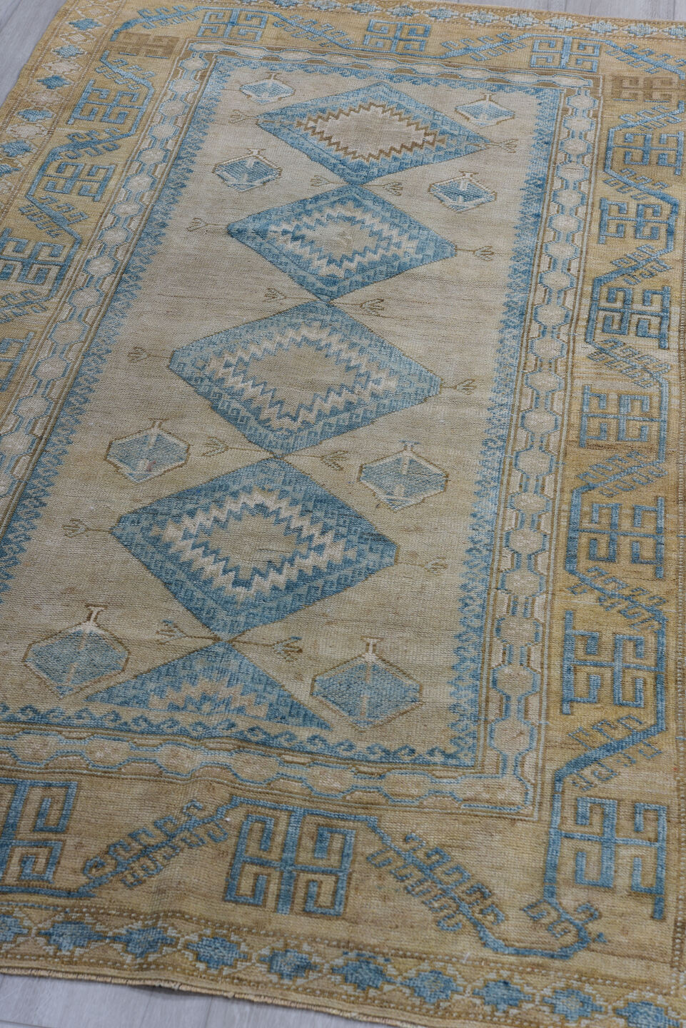 3' x 6' one-of-a-kind handmade antique Belouch small size rug. Color palette: ivory, sky blue, beige, camel, taupe