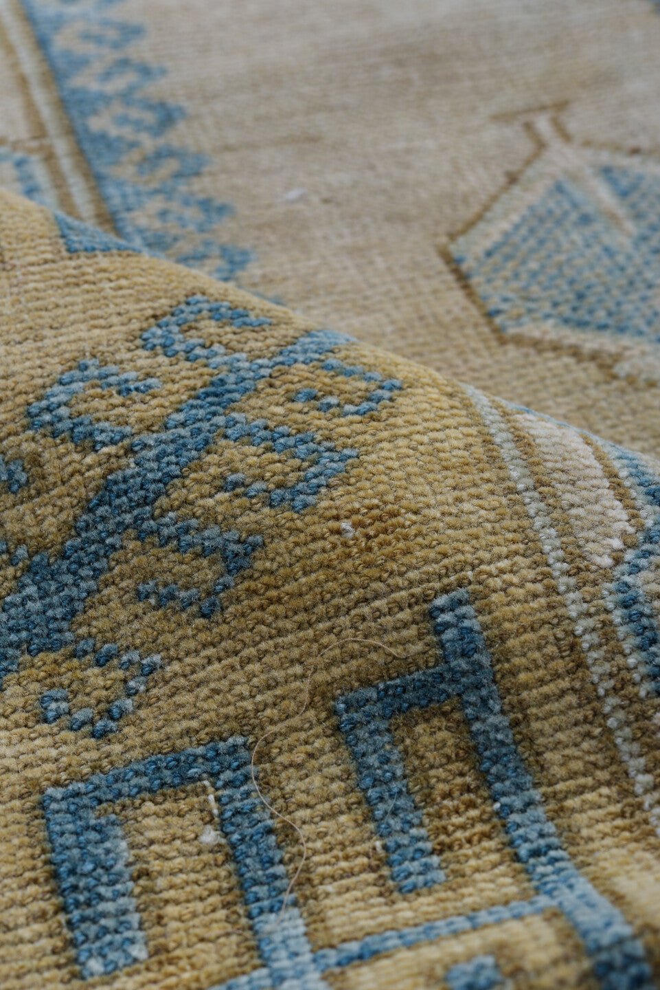 3' x 6' one-of-a-kind handmade antique Belouch small size rug. Color palette: ivory, sky blue, beige, camel, taupe