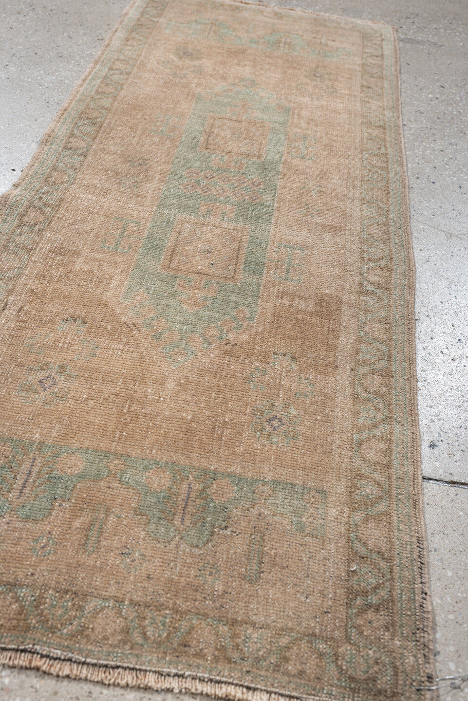 1' x 4' one-of-a-kind handmade vintage Oushak small size rug. Color palette: tan, sage, taupe, ivory, camel, beige, green