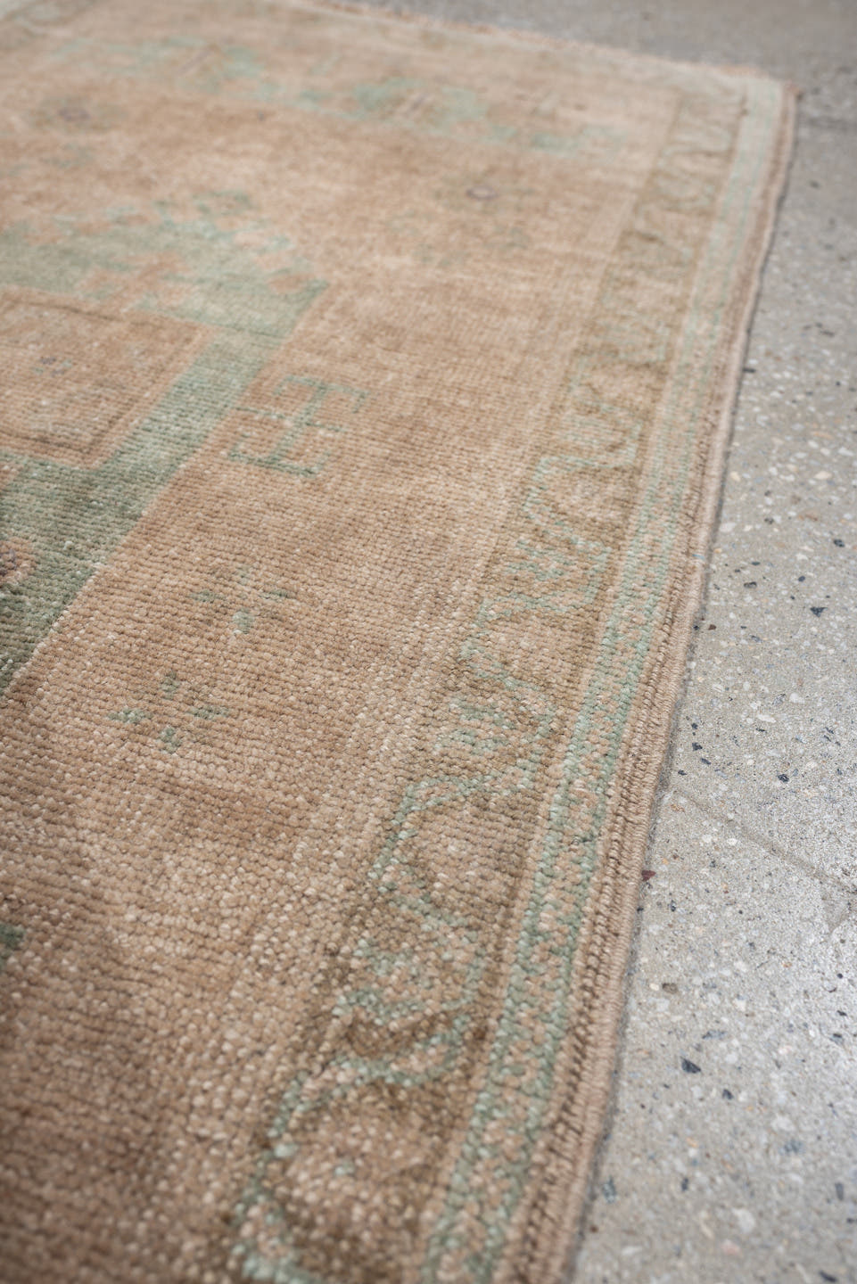 1' x 4' one-of-a-kind handmade vintage Oushak small size rug. Color palette: tan, sage, taupe, ivory, camel, beige, green