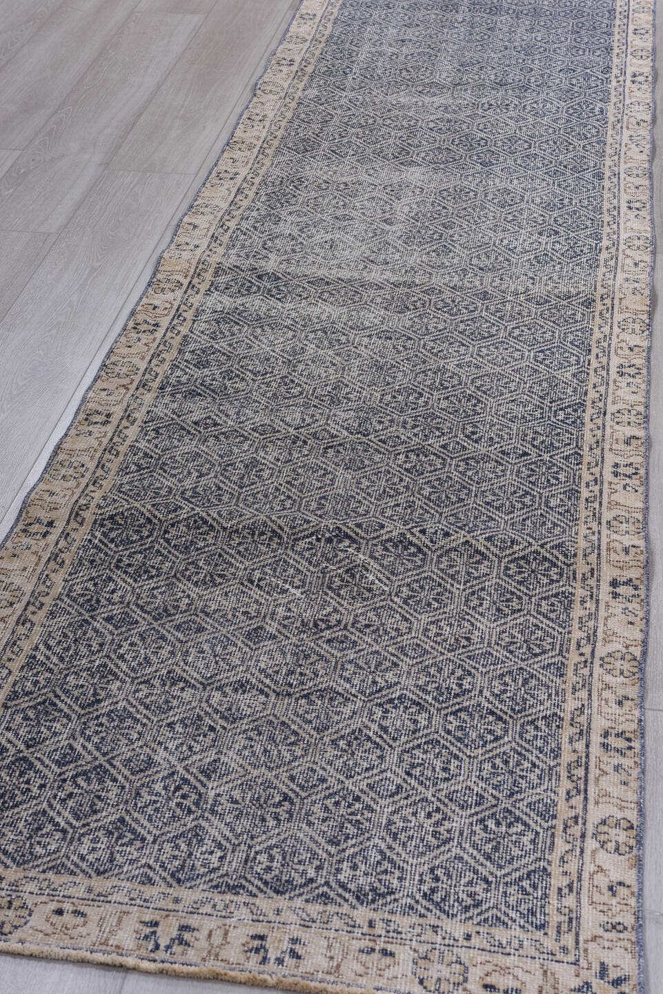 2' x 10' one-of-a-kind handmade antique Sparta runner rug. Color palette: indigo, ivory, slate, taupe, purple, gray, beige