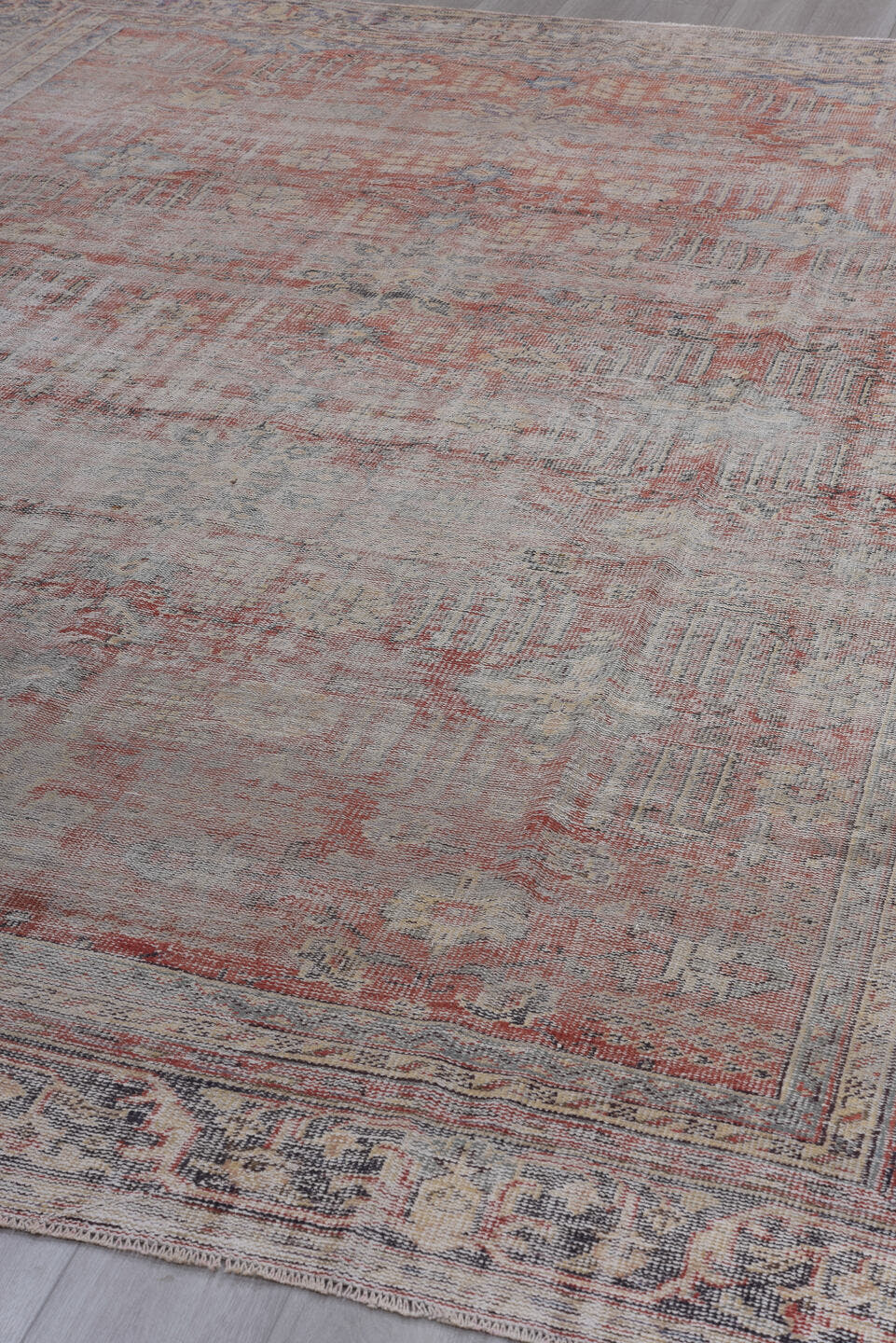 8' x 11' one-of-a-kind handmade antique Sparta large size rug. Color palette: taupe, dusty rose, slate, ivory, terra cotta
