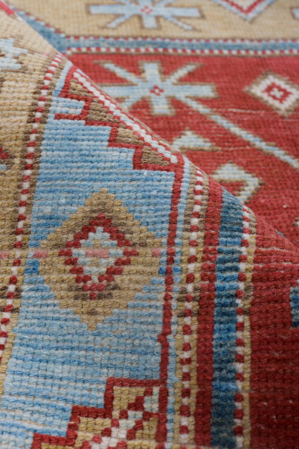 3' x 13' one-of-a-kind handmade antique Caucasian runner rug. Color palette: red, ivory, sky blue, camel, rust, navy