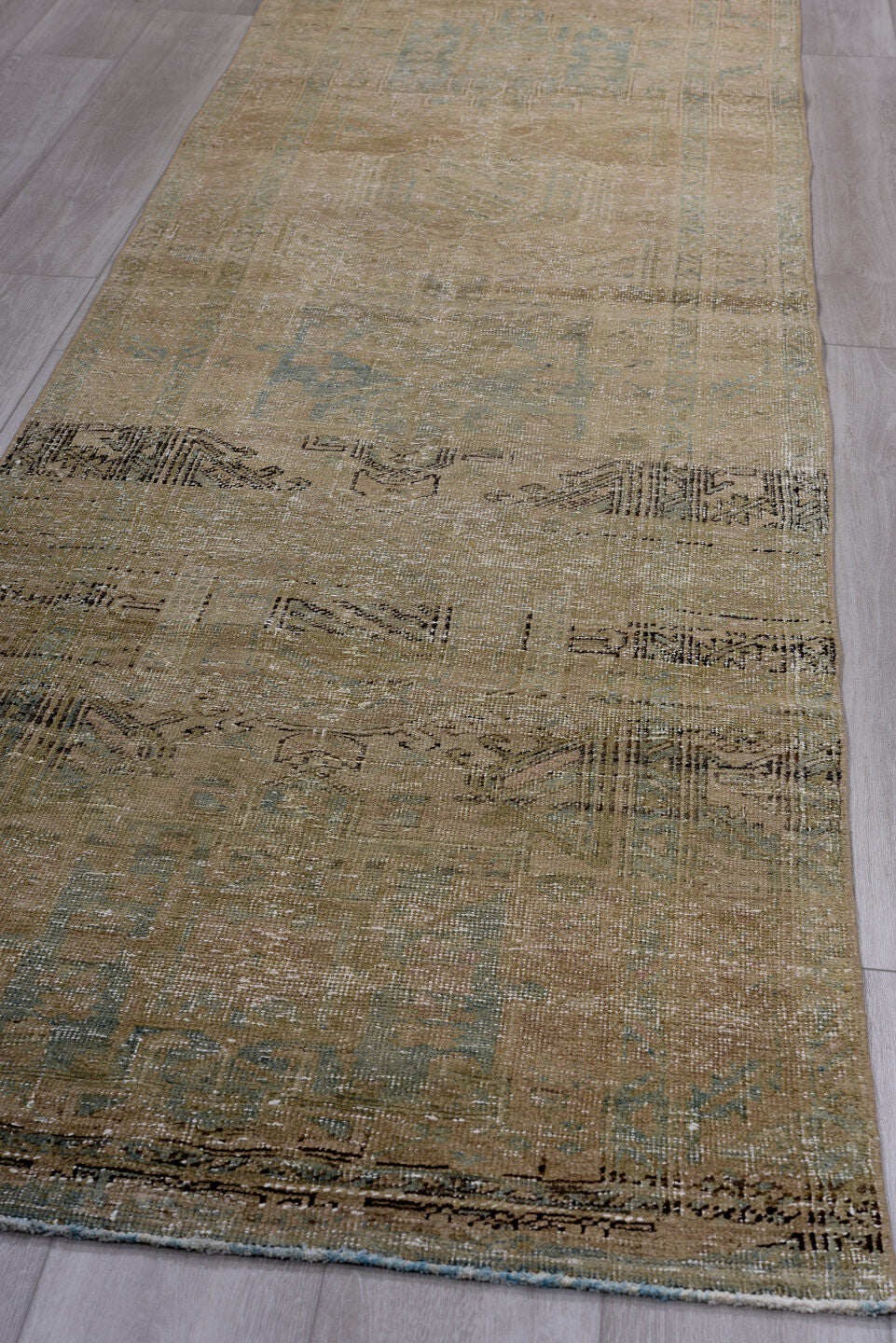 3' x 10' one-of-a-kind handmade antique Heriz runner rug. Color palette: taupe, camel, beige, pale_blue, ivory, brown, gray