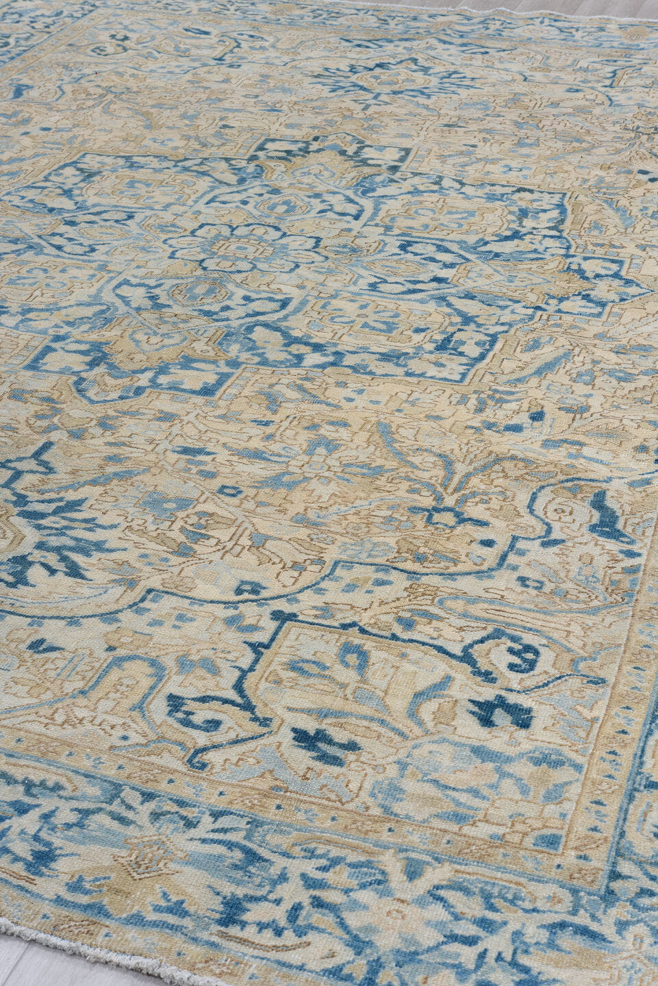 9' x 12' one-of-a-kind handmade antique Heriz large size rug. Color palette: ivory, sky blue, beige, camel, slate, taupe