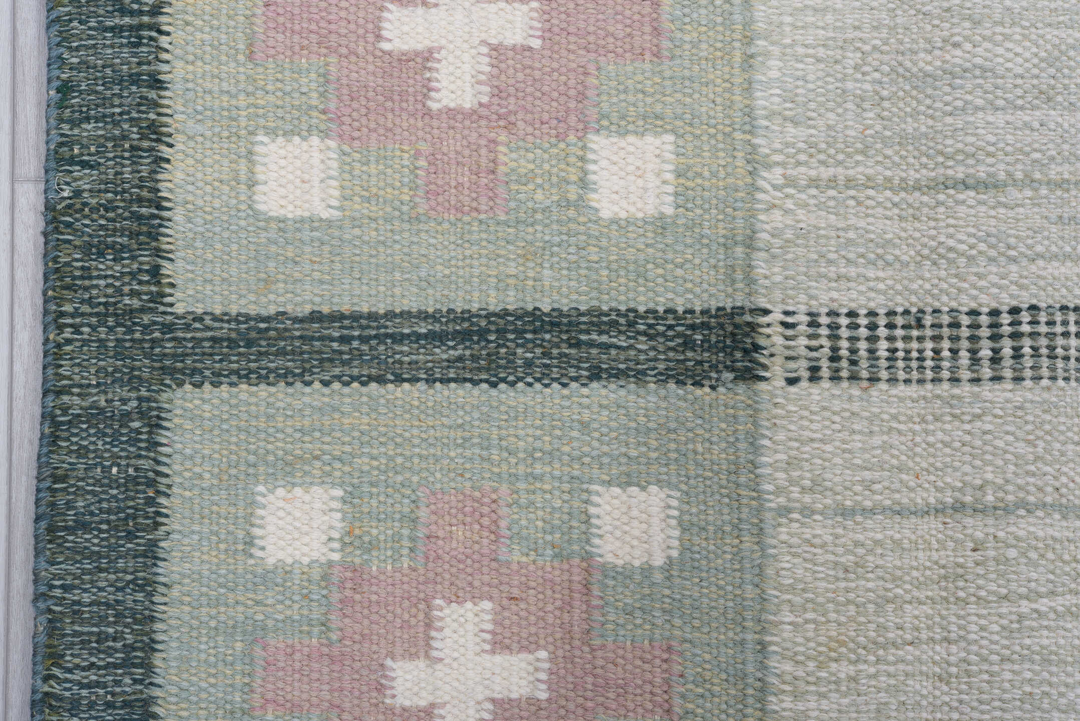 5' x 8' one-of-a-kind handmade antique Rollaken medium size rug. Color palette: ivory, sage, green, rose, cream, pink, red