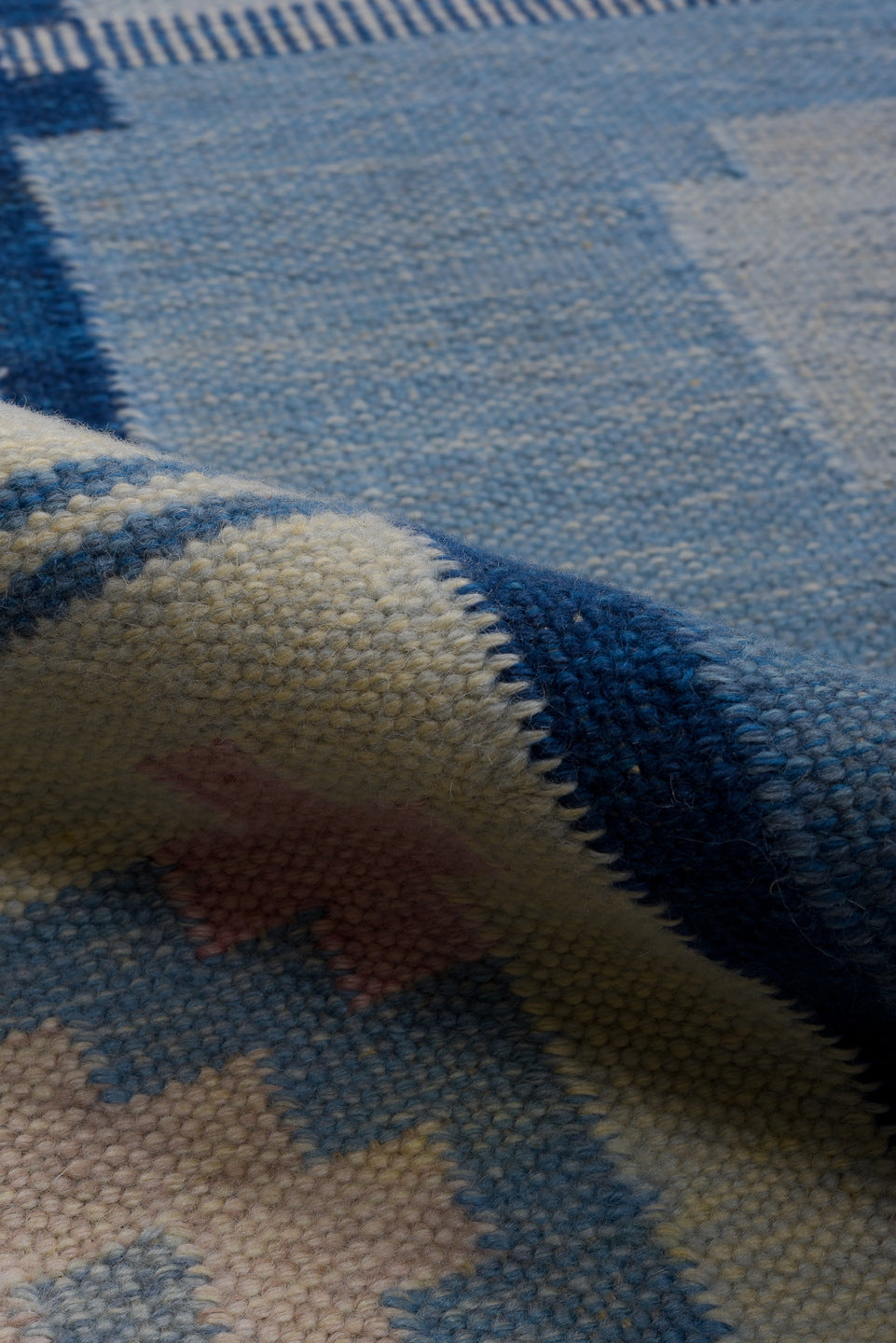 5' x 7' one-of-a-kind handmade vintage Rollaken rug. Color palette: black, blue, fiord, gray, light blue, light gray