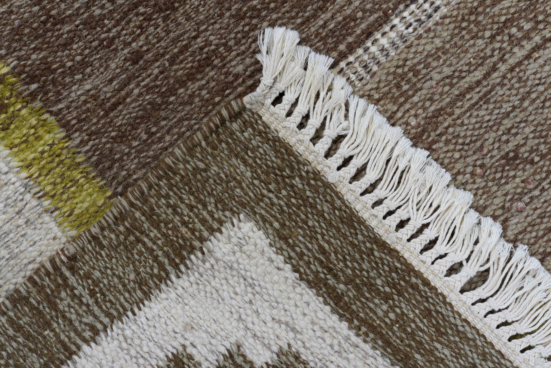 5' x 7' one-of-a-kind handmade antique Rollaken rug. Color palette: brown, ivory, taupe, olive, camel, beige, gray, green