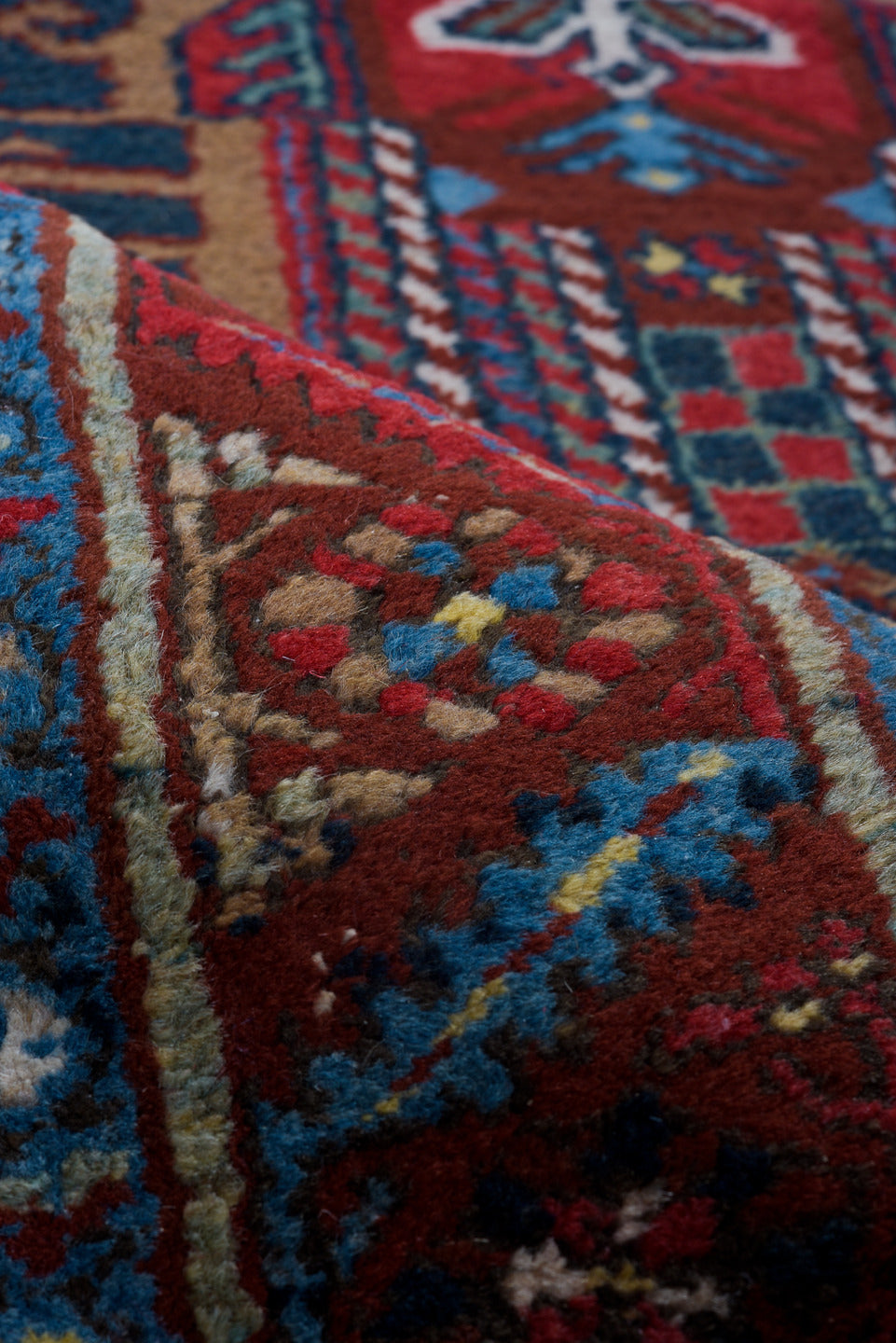 3' x 14' one-of-a-kind handmade vintage Heriz runner rug. Color palette: navy, brick red, ivory, sky blue, rust, camel