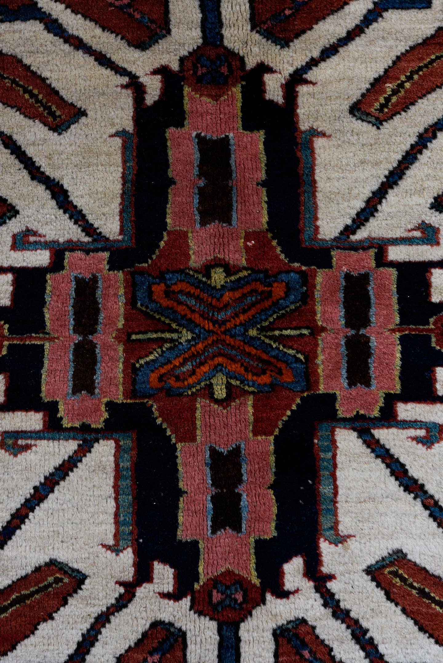4' x 7' one-of-a-kind handmade antique Karaje rug. Color palette: rust, ivory, blue, navy, crimson, charcoal, camel, teal