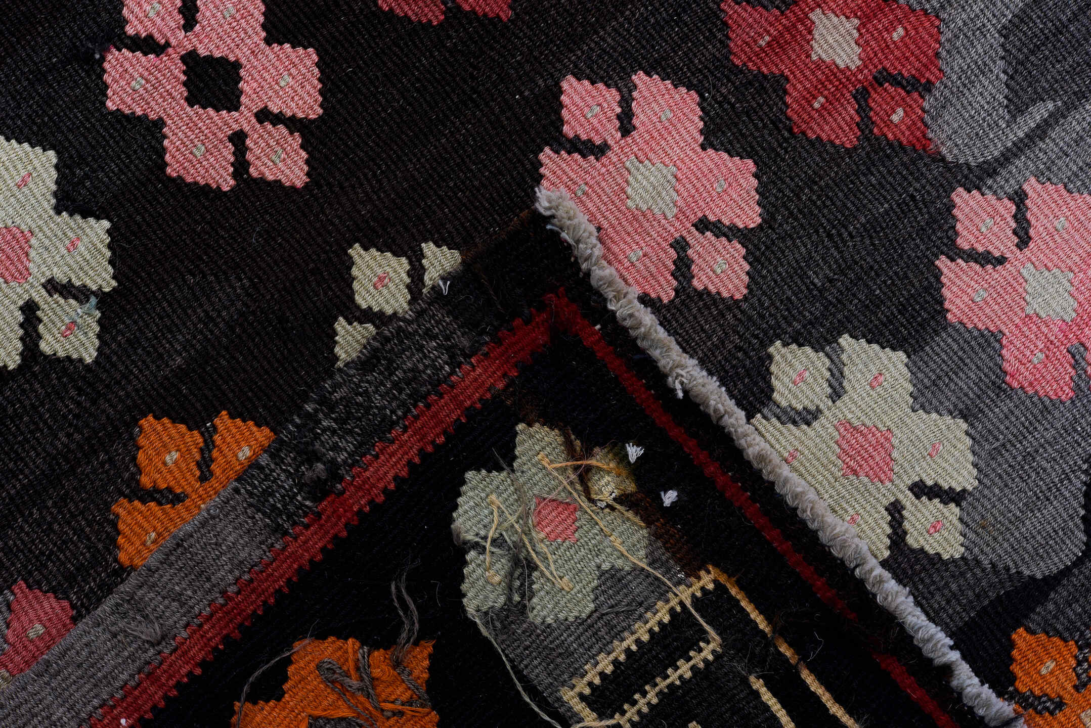 7' x 8' one-of-a-kind handmade antique Kilim rug. Color palette: charcoal, rose, ivory, rust, crimson, saffron, gray, black