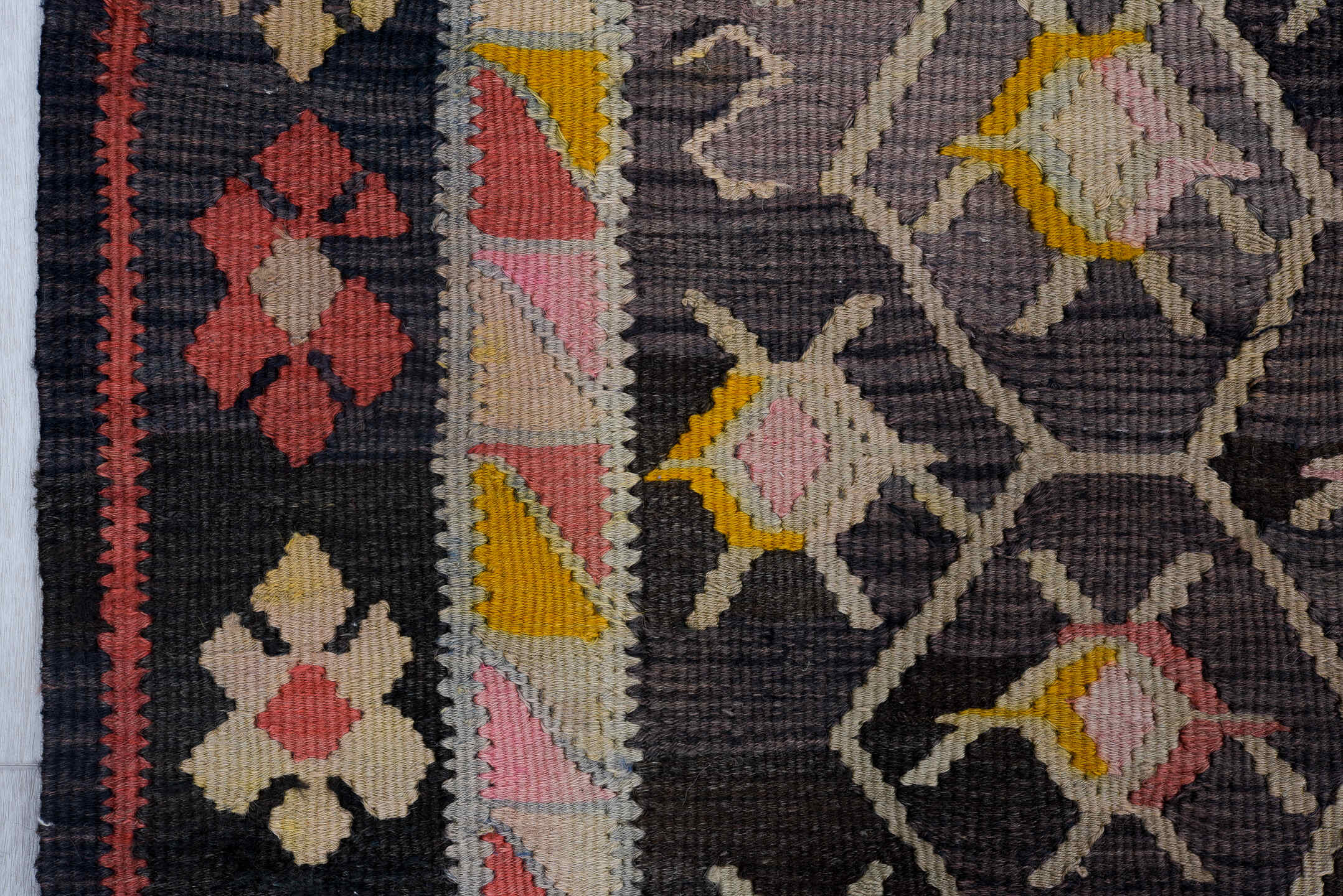 4' x 10' one-of-a-kind handmade antique Kilim runner rug. Color palette: charcoal, rose, ivory, saffron, taupe, coral, brown