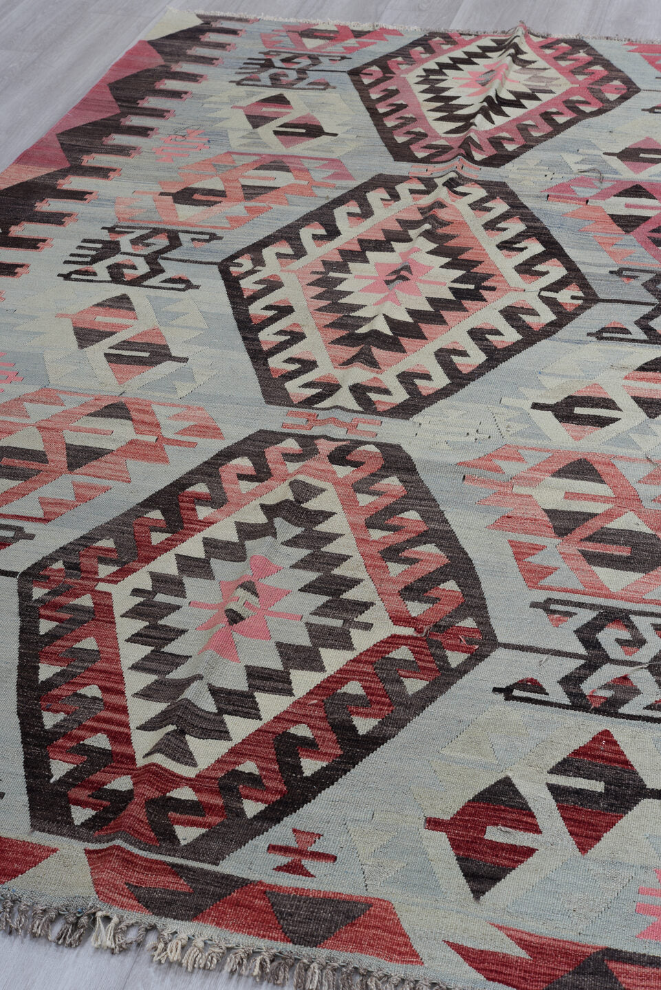 6' x 9' one-of-a-kind handmade antique Kilim medium size rug. Color palette: pale blue, charcoal, rose, ivory, crimson