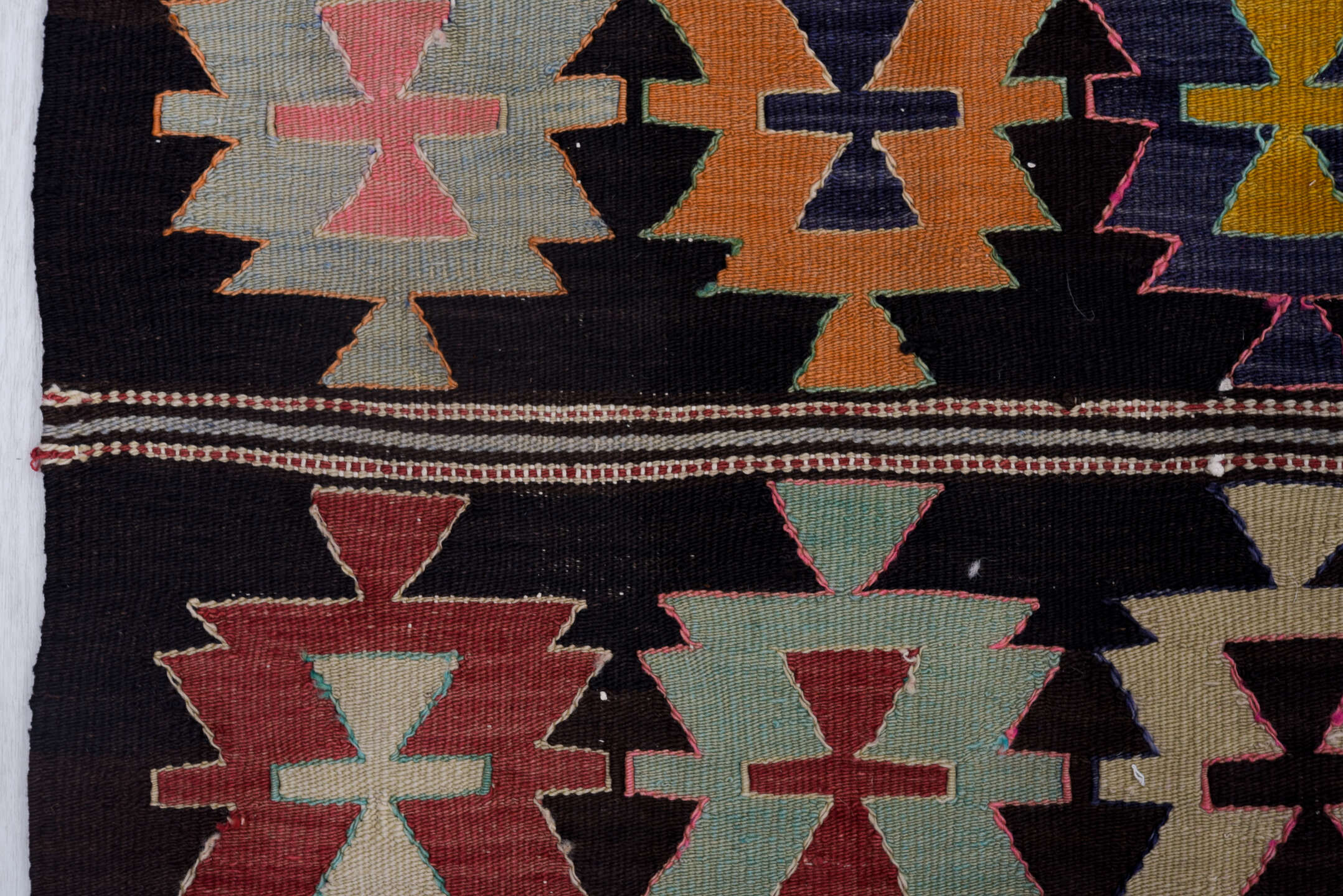 5' x 9' one-of-a-kind handmade vintage Kilim medium size rug. Color palette: black, blue, brown, charcoal, gray, light gray