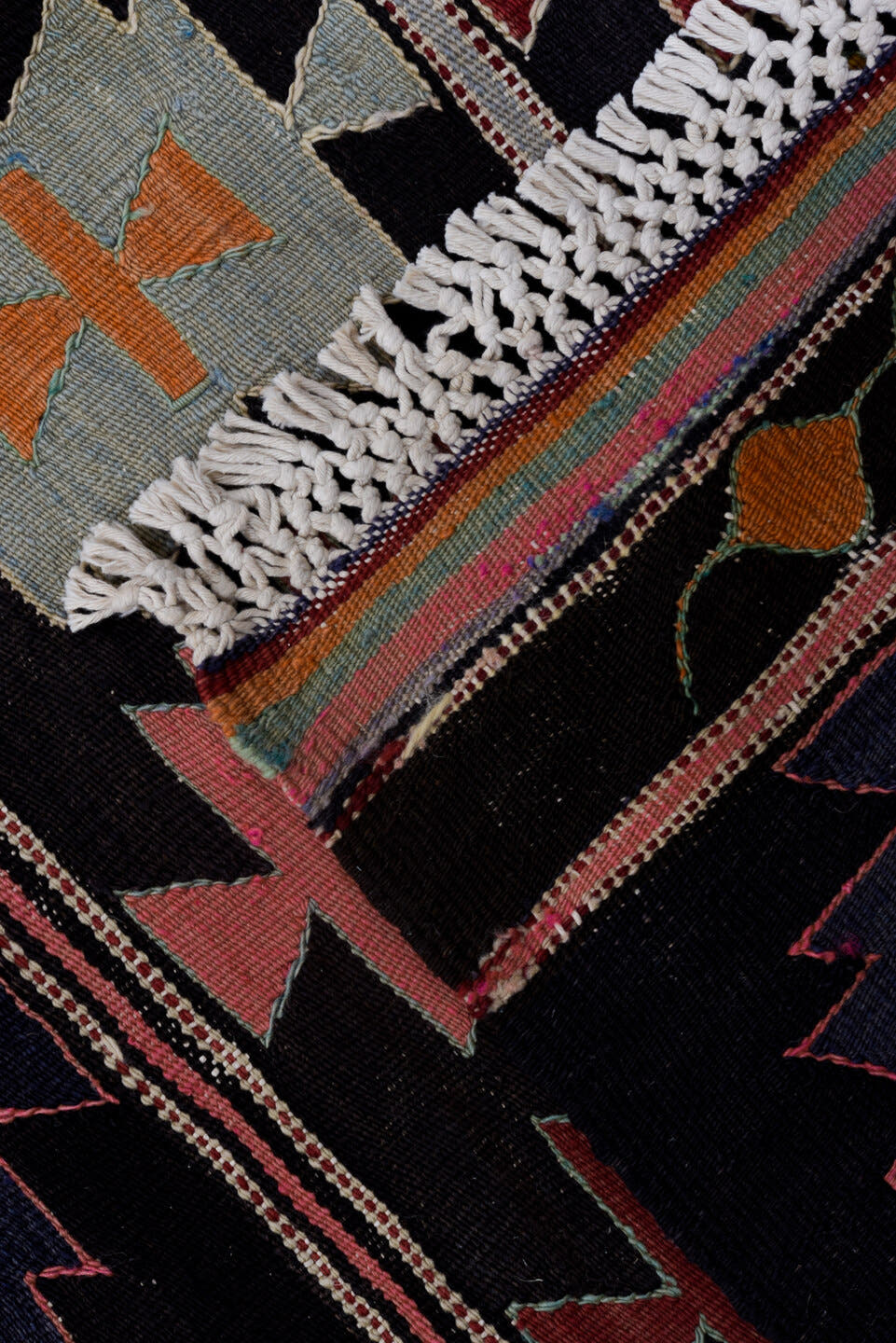 5' x 9' one-of-a-kind handmade antique Kilim medium size rug. Color palette: charcoal, rose, ivory, rust, sage, indigo