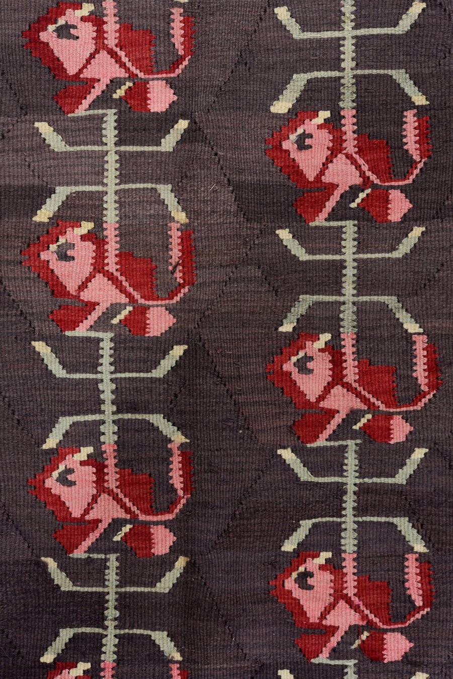 5' x 11' one-of-a-kind handmade antique Besserabian rug. Color palette: charcoal, taupe, crimson, rose, ivory, black, gray
