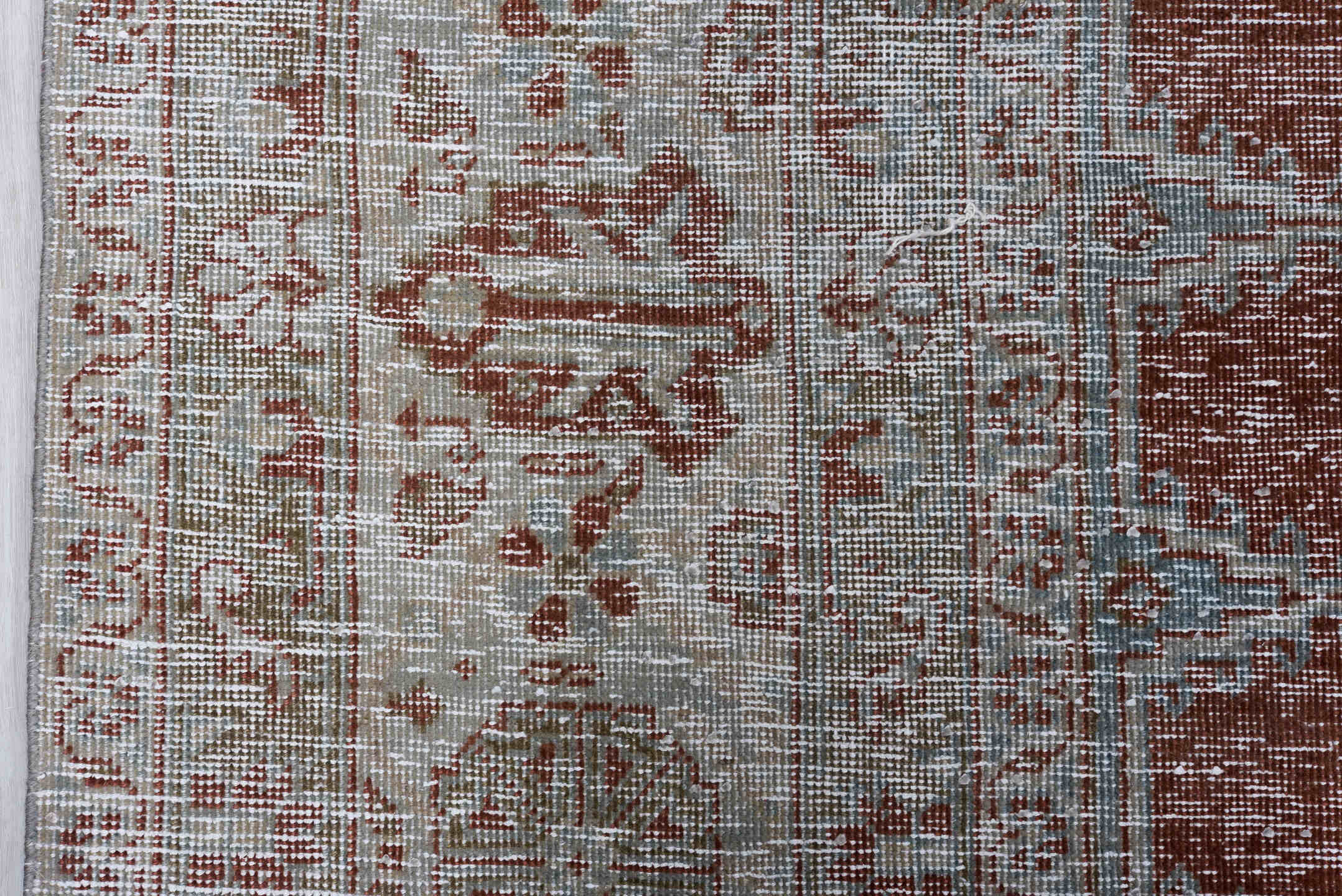 10' x 12' one-of-a-kind handmade antique Veece large size rug. Color palette: terra cotta, ivory, pale blue, taupe, rust