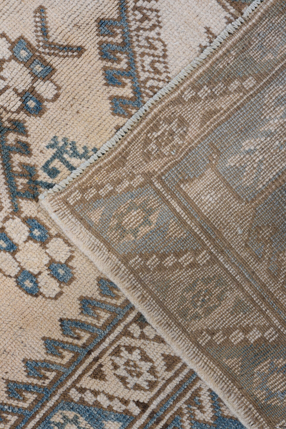 4' x 5' one-of-a-kind handmade vintage Oushak small size rug. Color palette: ivory, sky blue, taupe, brown, pale blue