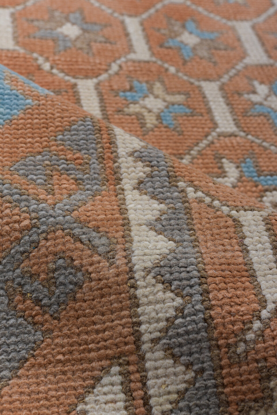 3' x 11' one-of-a-kind handmade antique Oushak runner rug. Color palette: terra cotta, ivory, sky blue, taupe, camel, brown