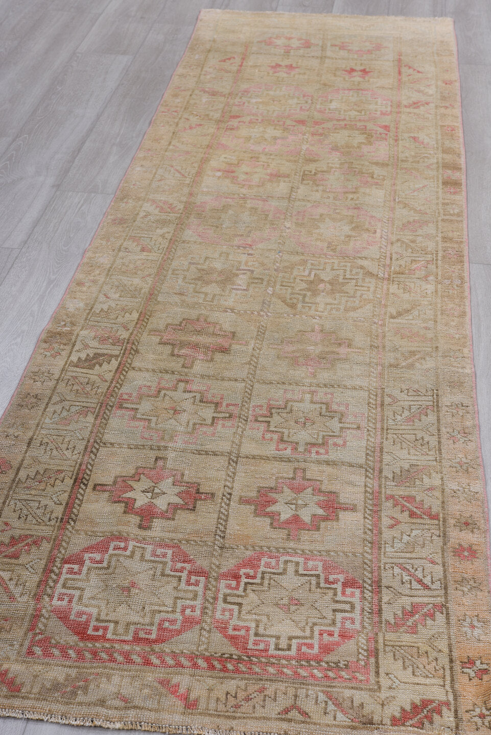 2' x 9' one-of-a-kind handmade vintage Oushak runner rug. Color palette: brown, gray, light gray, off-white, pink, red